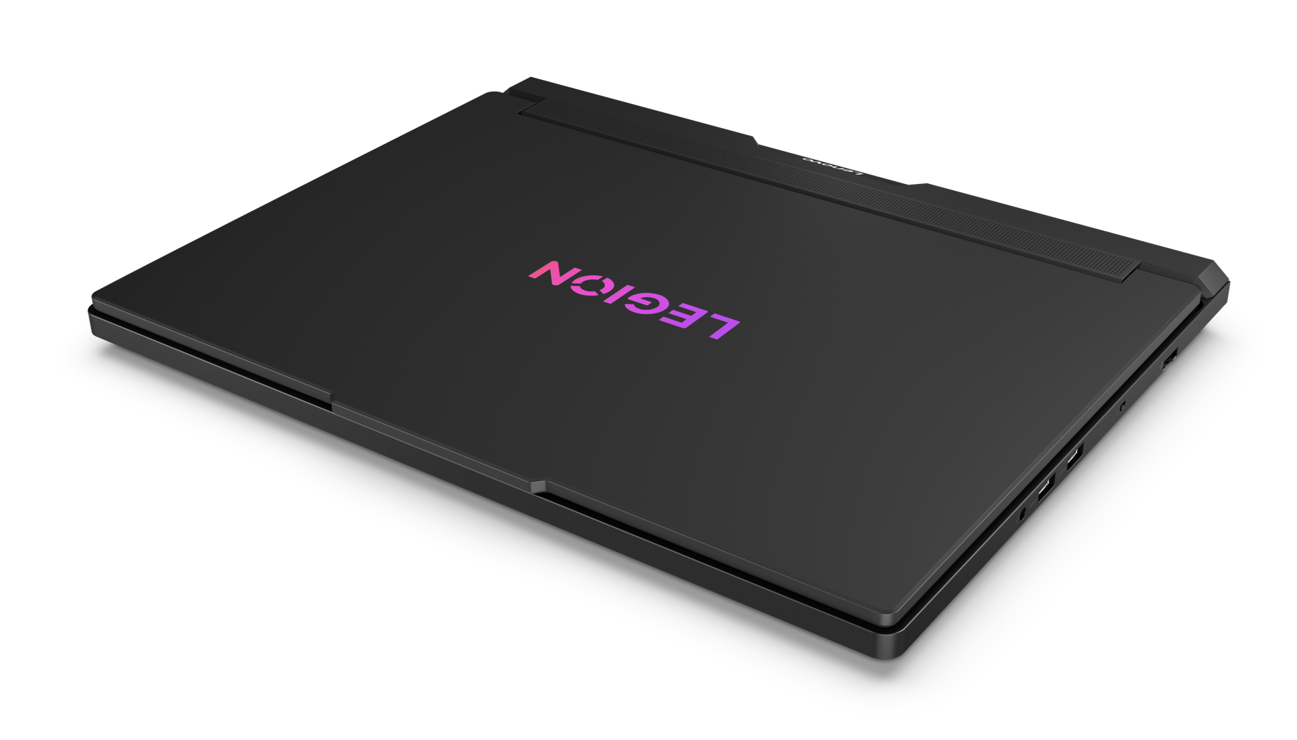 Zamknięty czarny laptop z fioletowo-różowym logo "LEGION".