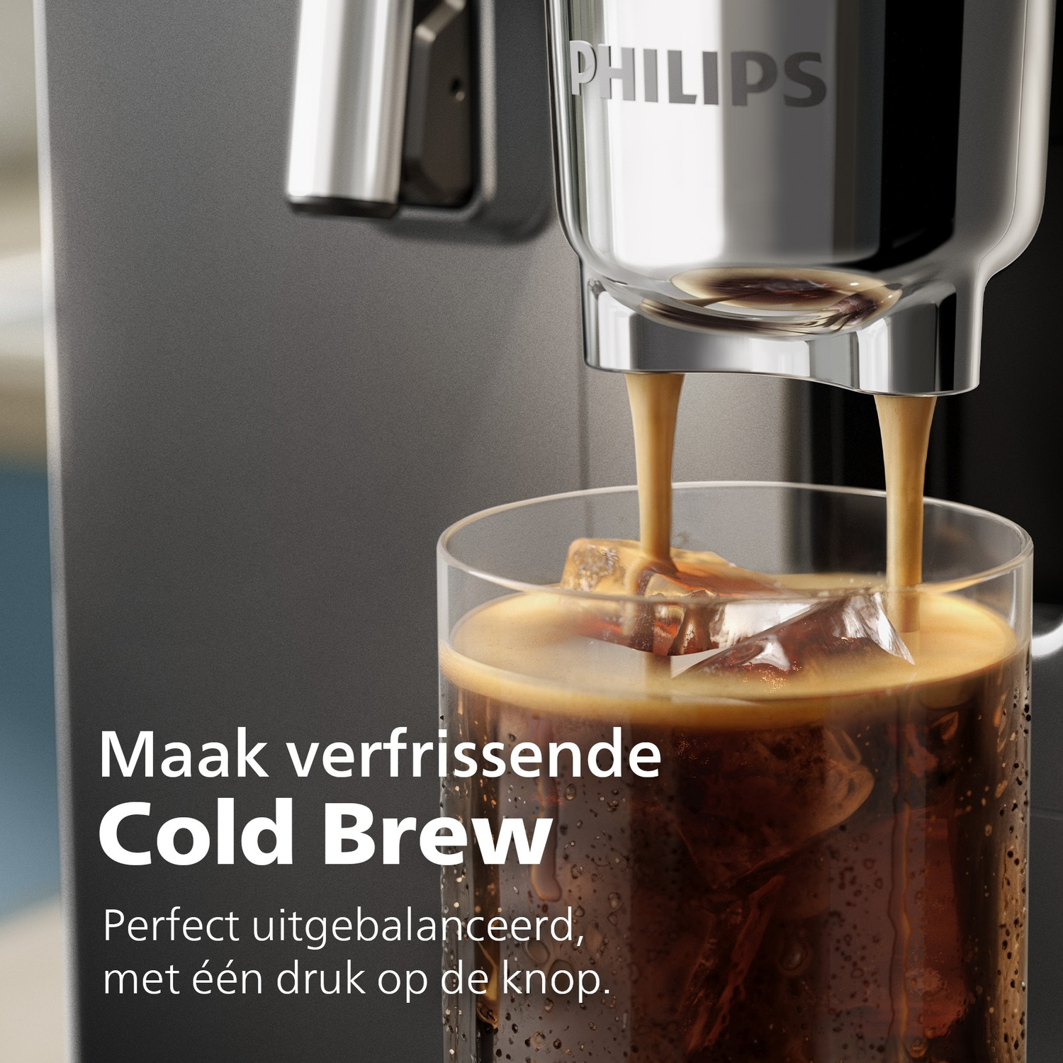 Coffee machine brewing cold brew with ice into a glass.