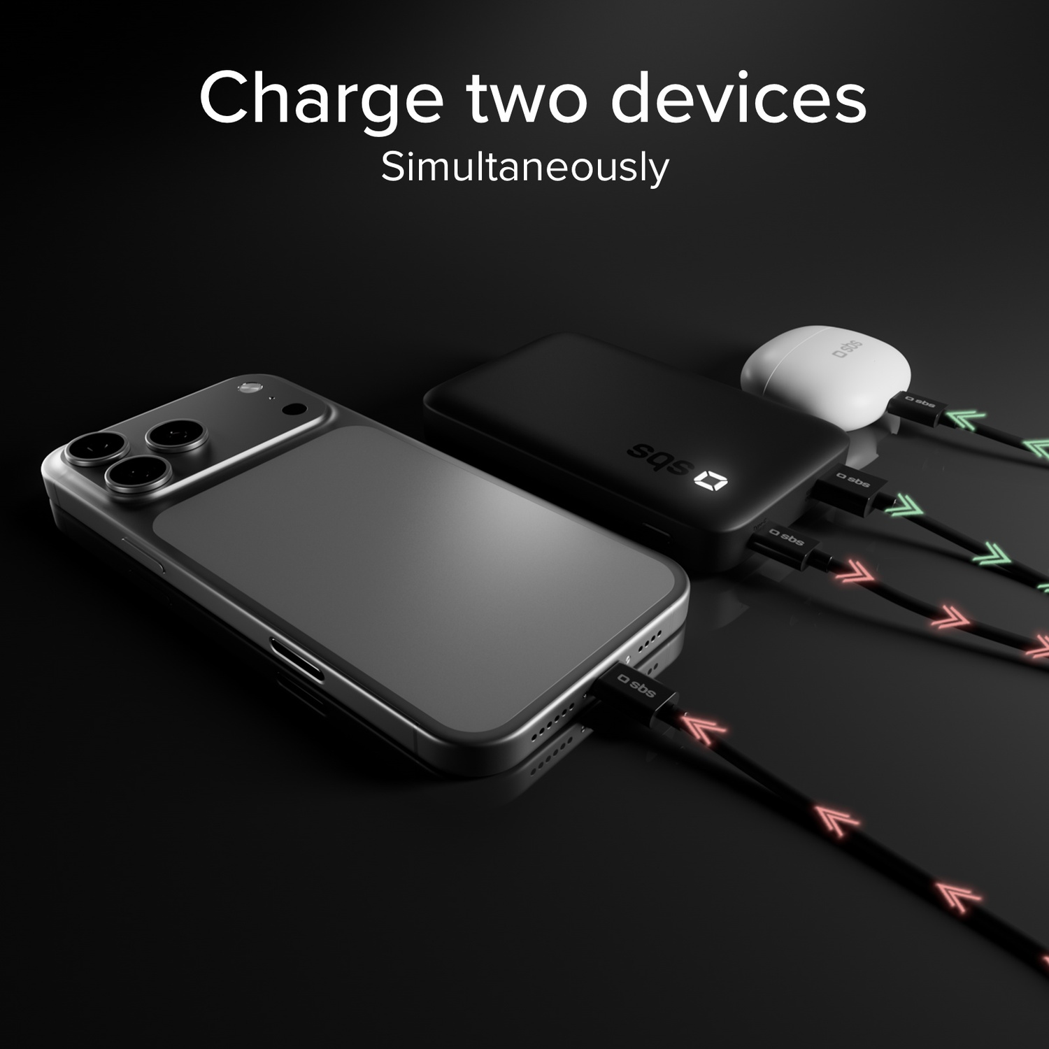 Een smartphone, een powerbank en oordopjes worden tegelijkertijd opgeladen.