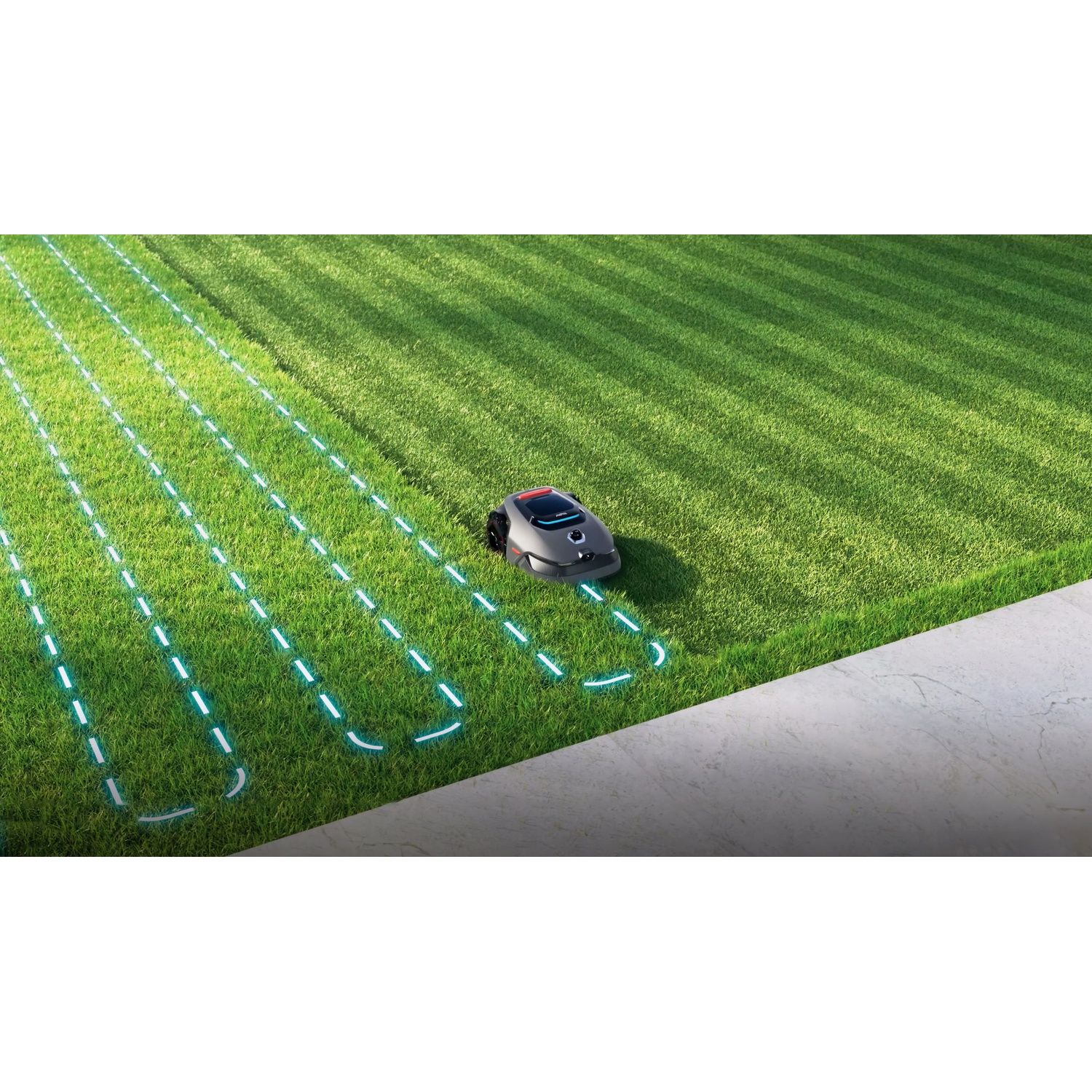 Un robot tondeuse sur une pelouse avec des lignes de délimitation lumineuses.
