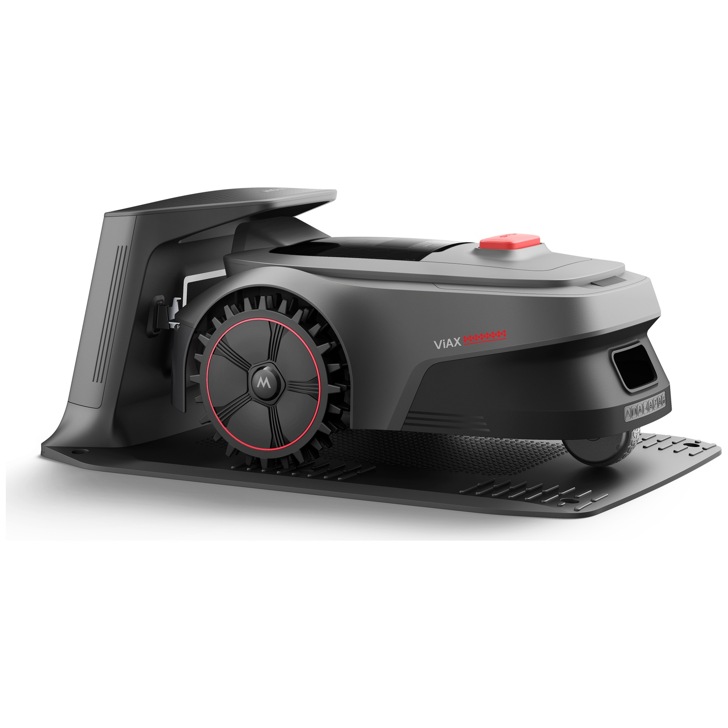 Een grijze robotmaaier met een rode knop op een laadstation.