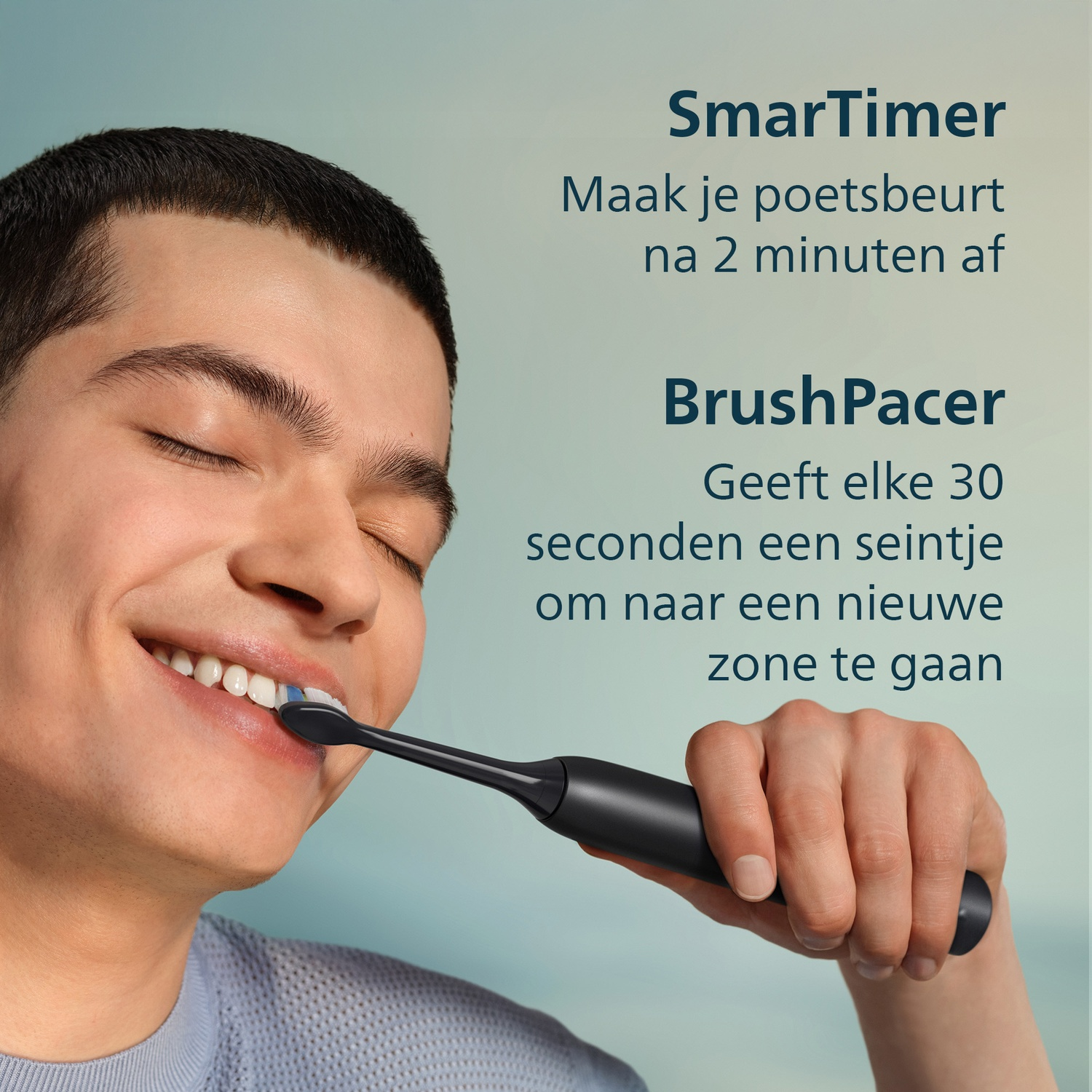 Man poetst tanden met zwarte elektrische tandenborstel, met tekst over timer.