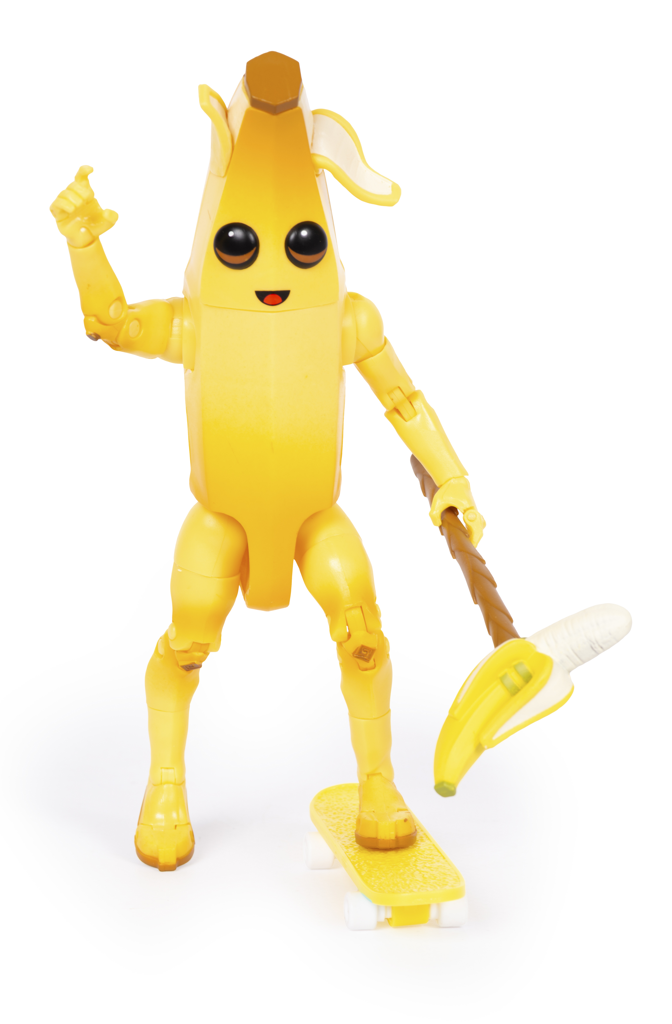 Eine gelbe Bananenfigur mit Armen und Beinen fährt Skateboard und hält eine Bananen-Spitzhacke.