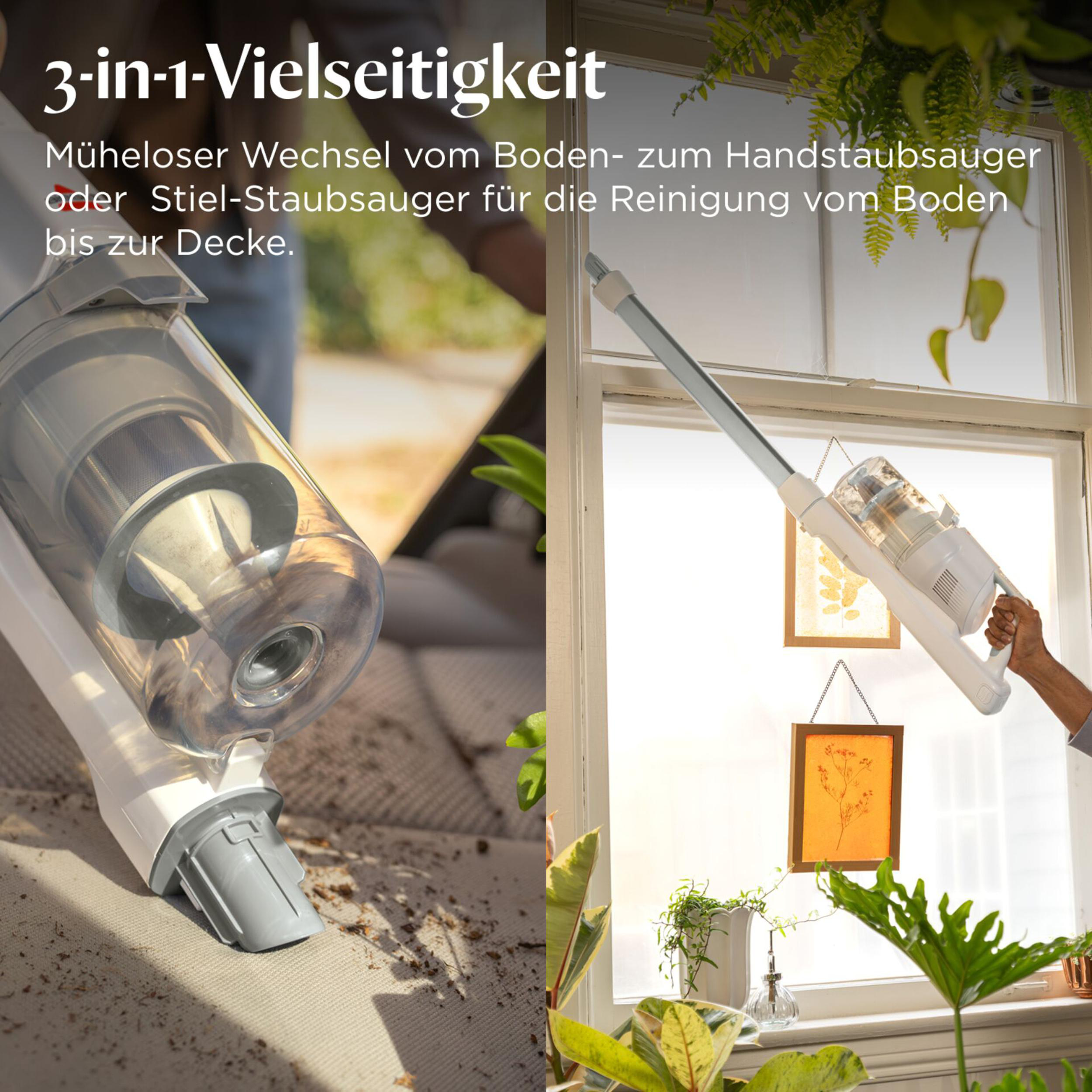 Ein weißer Akku-Staubsauger wird zum Fensterputzen verwendet.