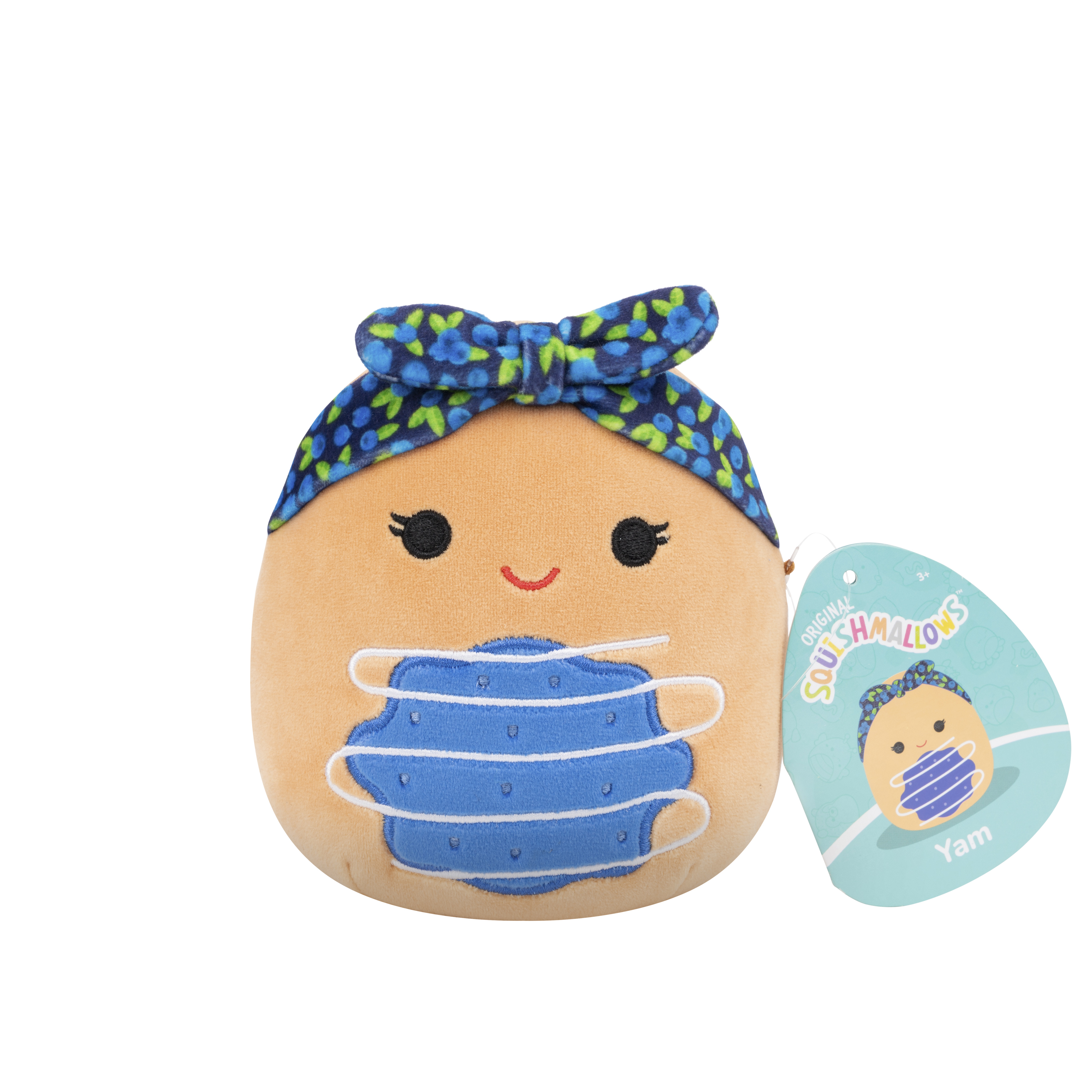 Ein orangefarbener Squishmallow mit blauer Maske und Bandana auf weißem Hintergrund.