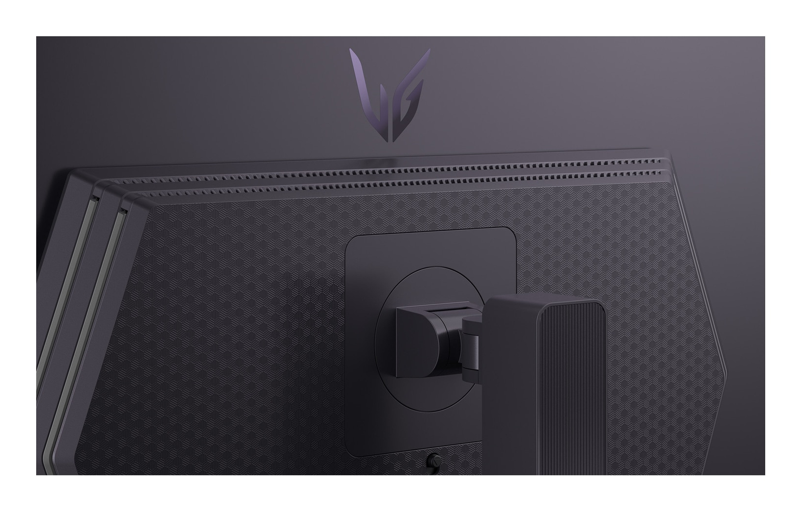 Tył monitora z logo LG i wzorem kratki.
