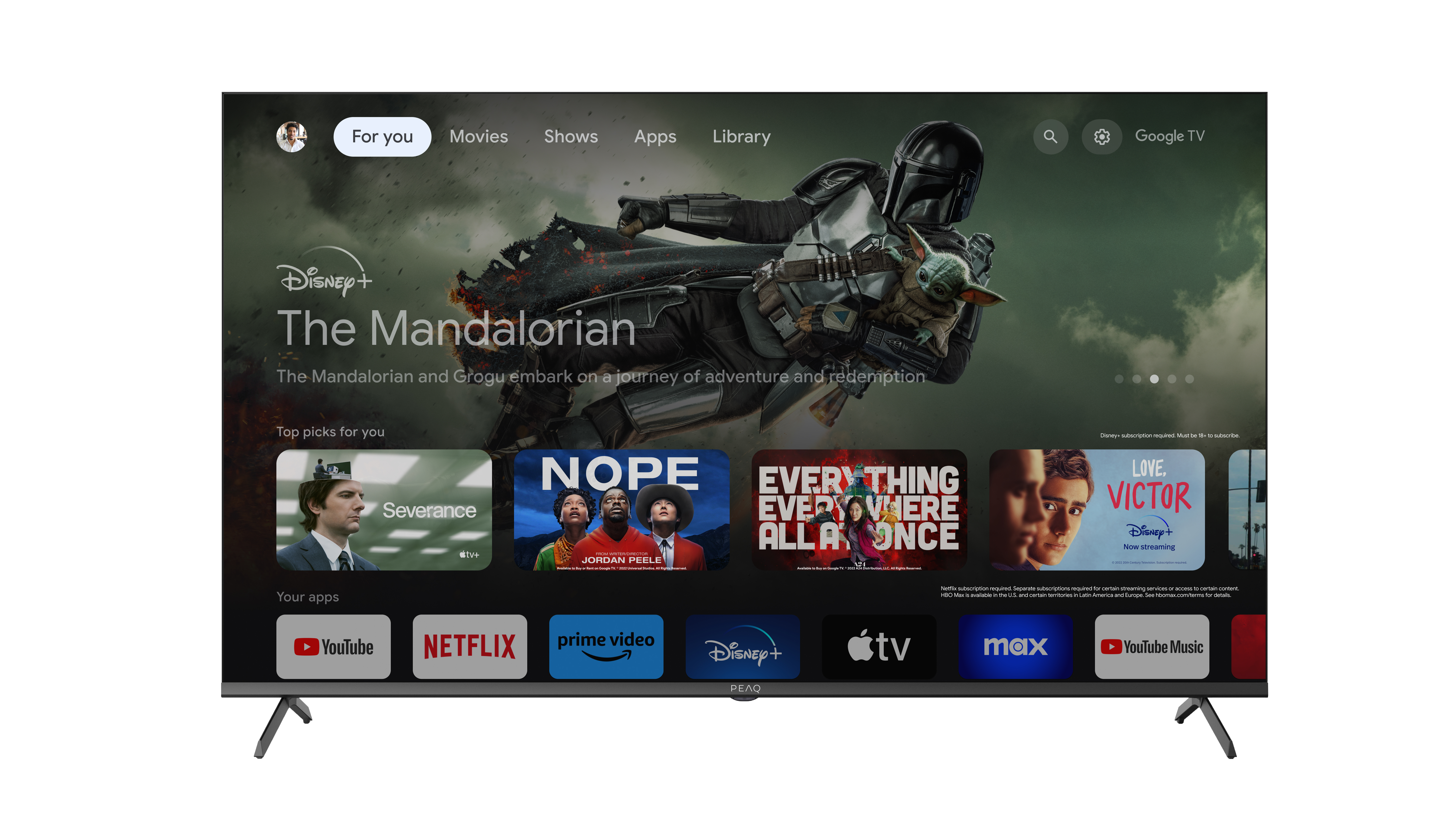 Ekran główny Google TV z banerem 'The Mandalorian' i ikonami filmów/aplikacji.