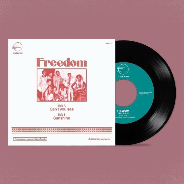 Eine Schallplattenhülle und eine Schallplatte für Freedom mit Gruppenfoto und Songtiteln.