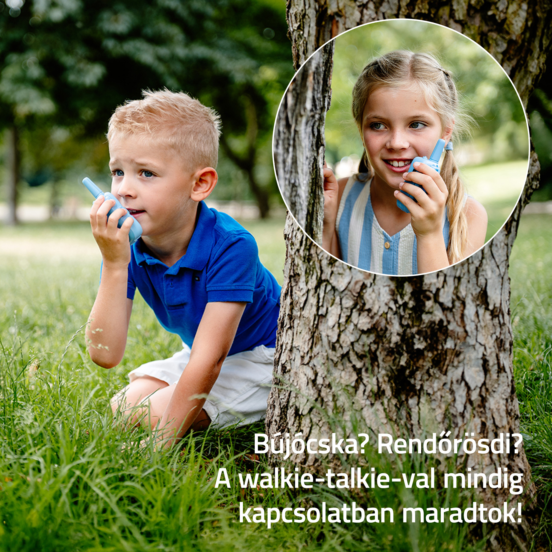 Fiú walkie-talkieval a fűben, lány körben a fa mögött.