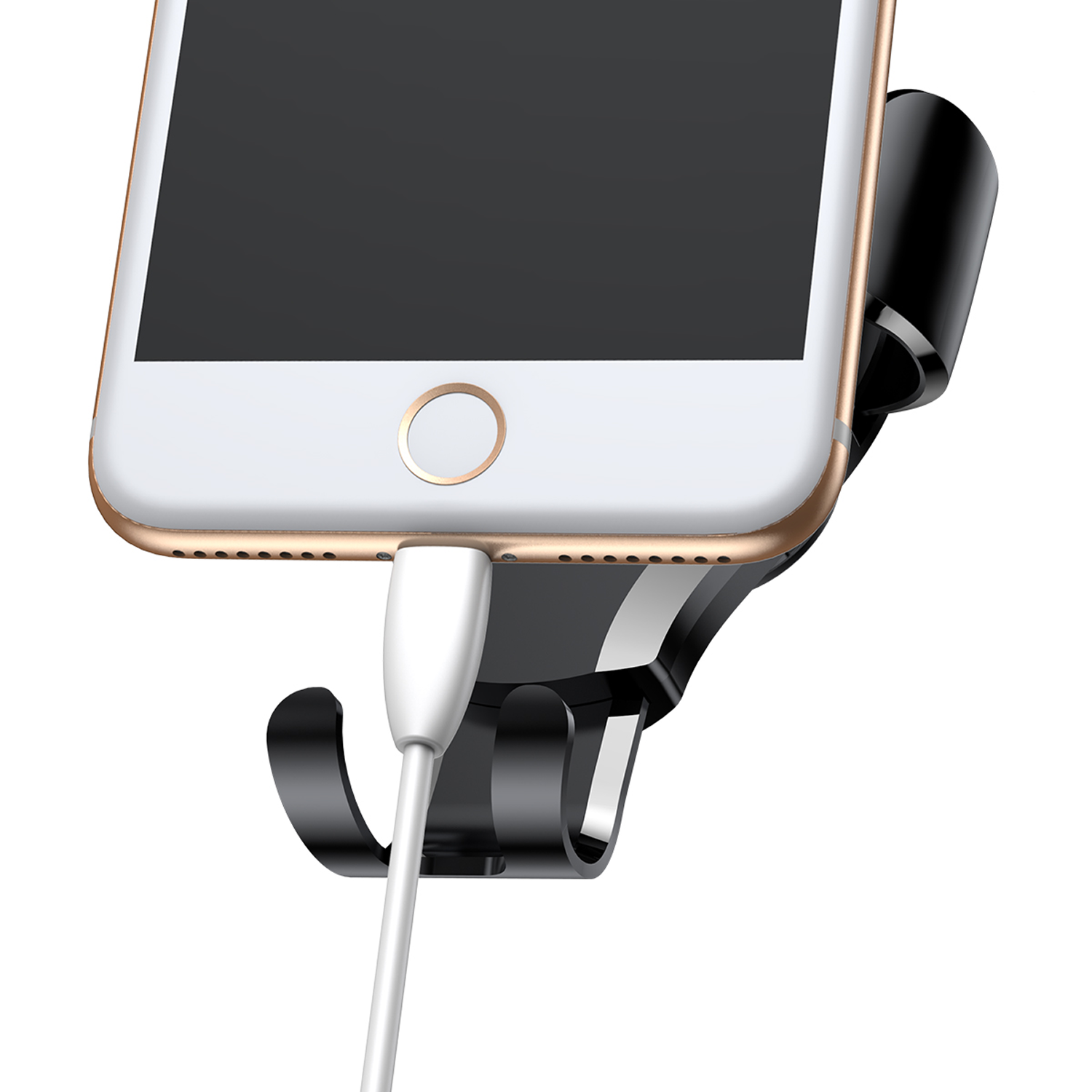 Un smartphone blanco con cable de carga en un soporte negro.