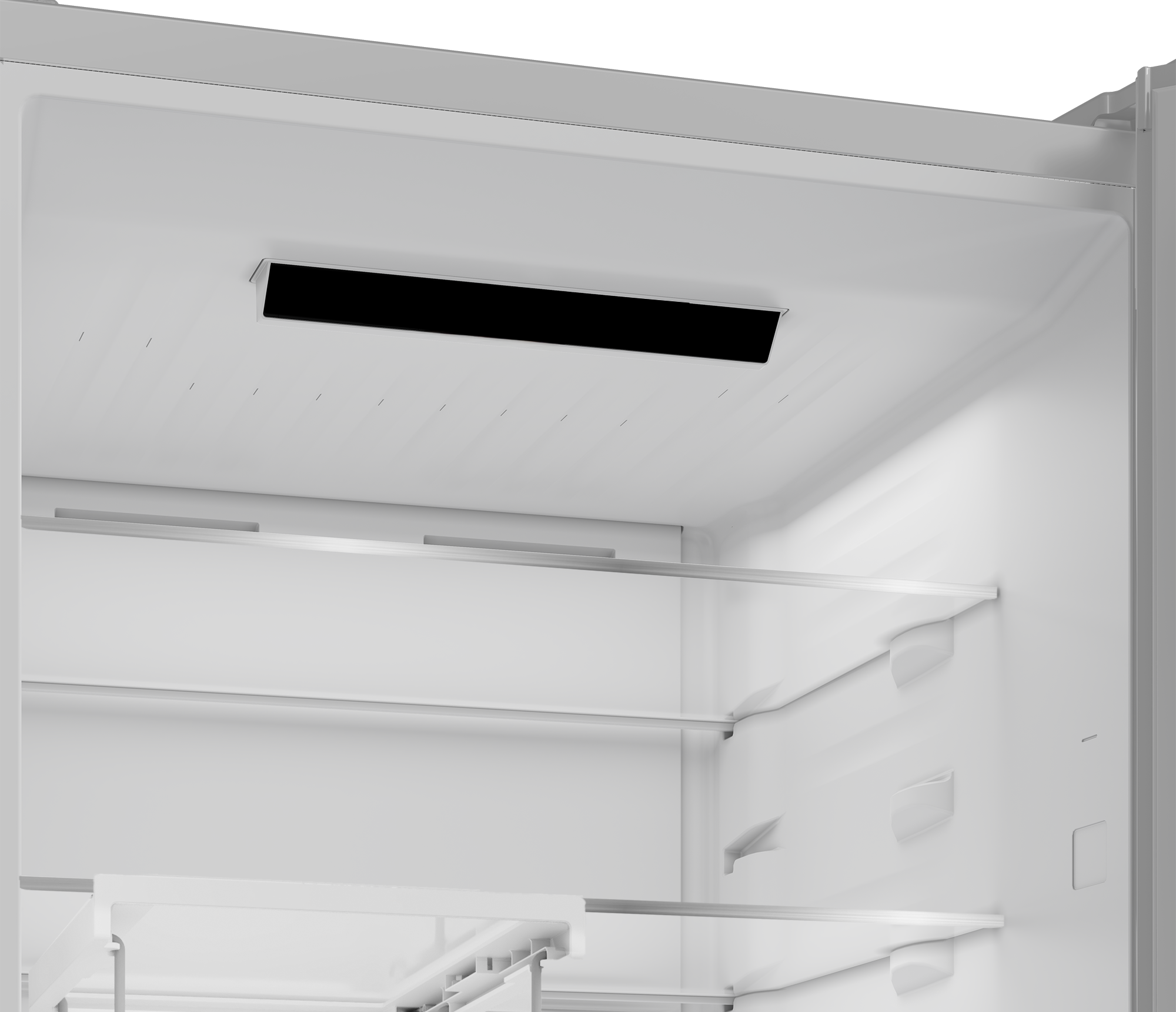 Interior de un refrigerador blanco con estantes de vidrio y ventilación negra.