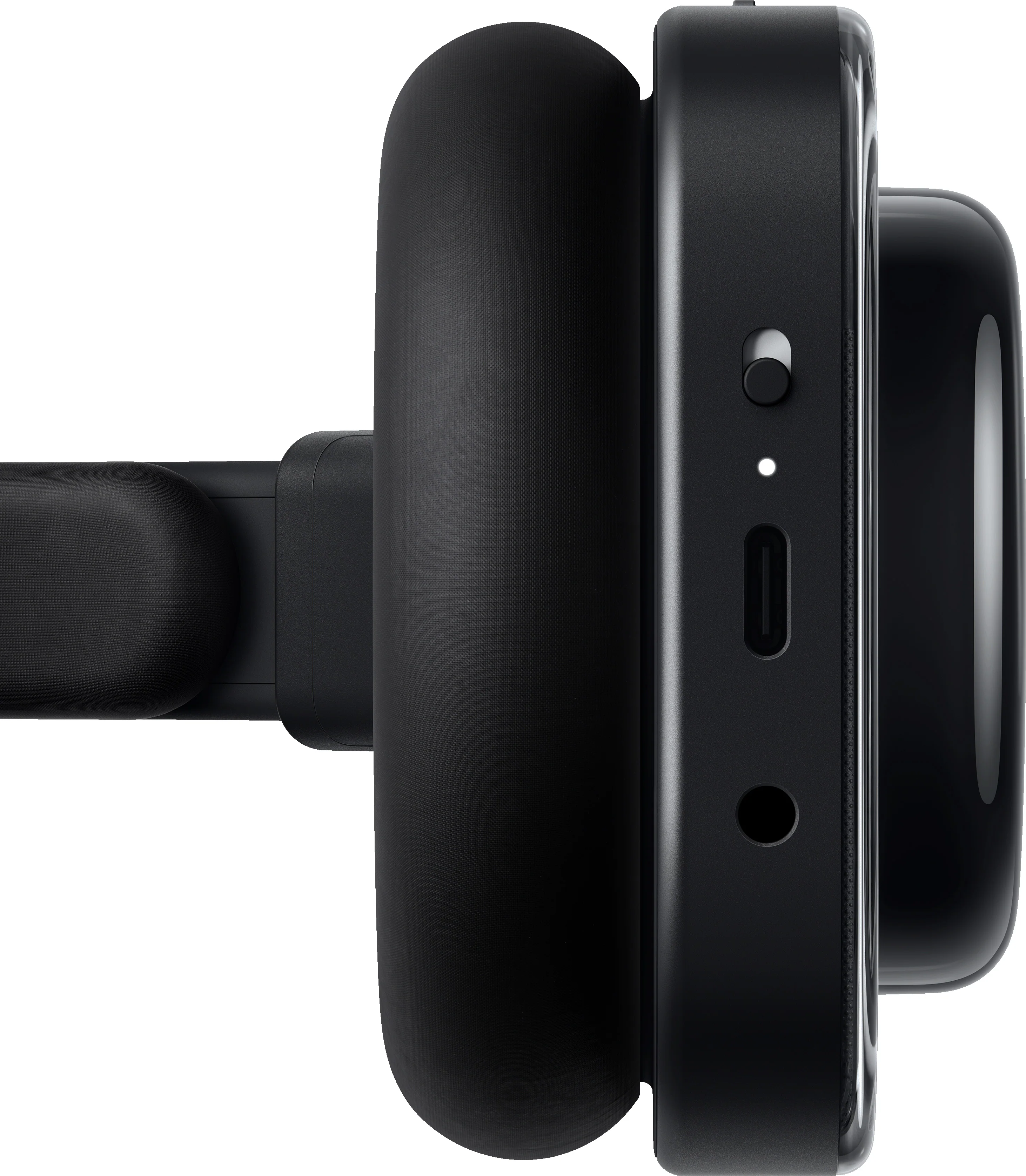 Casque noir avec interrupteur, LED et port de chargement.