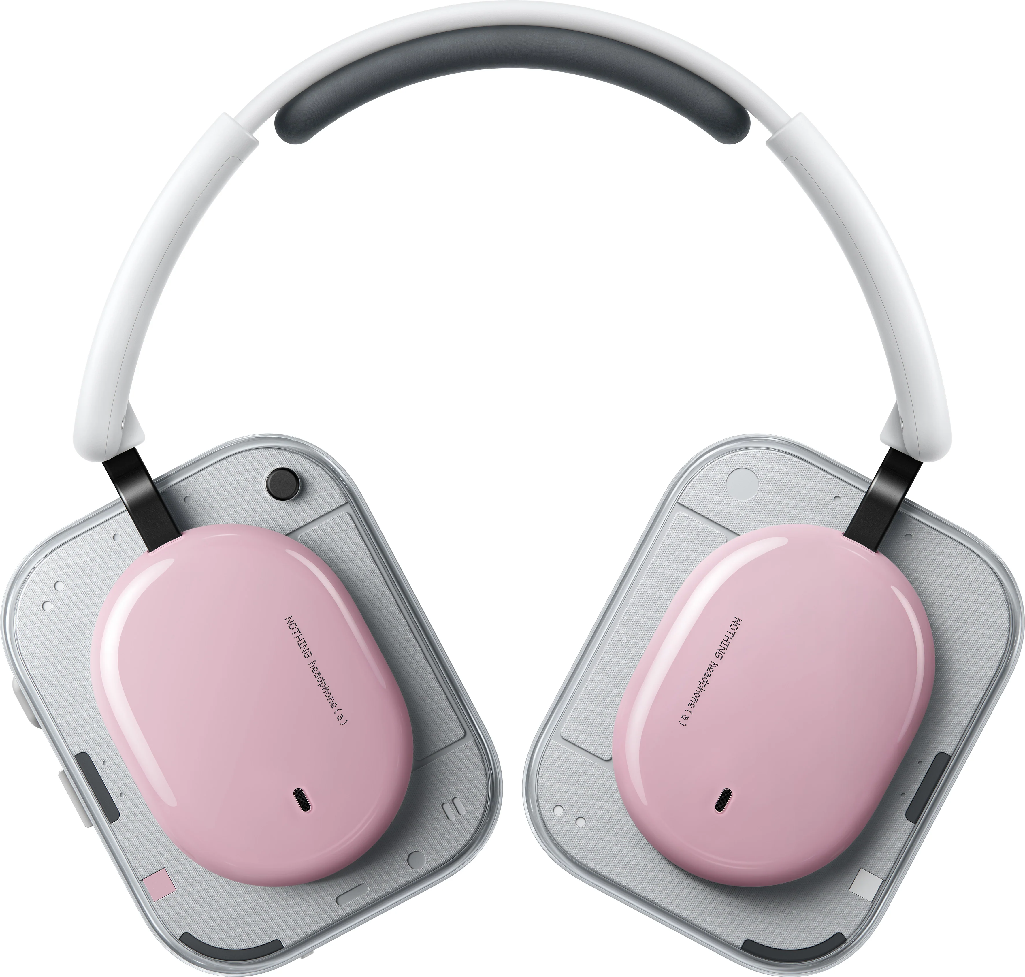 Casque rose avec arceau blanc et écouteurs argentés sur fond blanc.