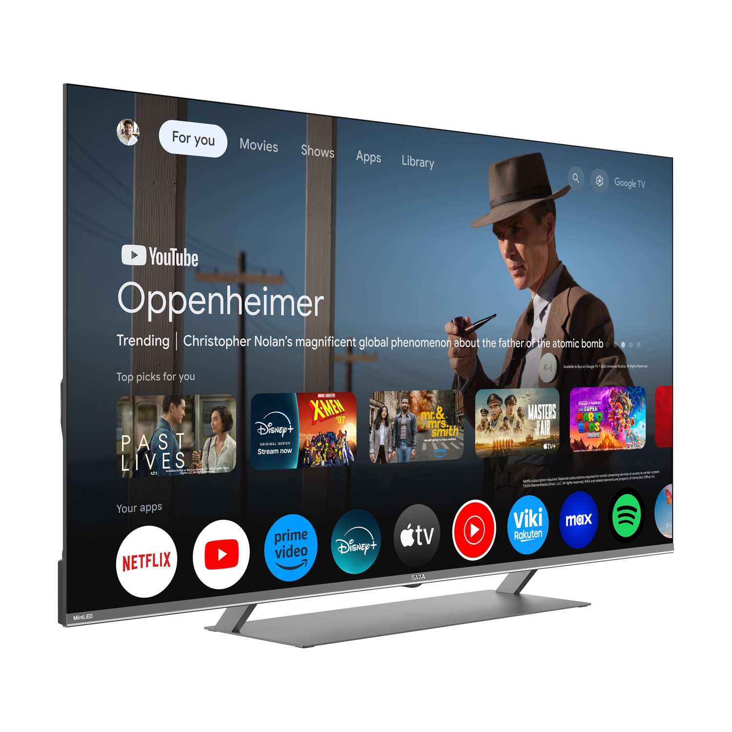 Una TV moderna mostra l'interfaccia di Google TV con film e app.