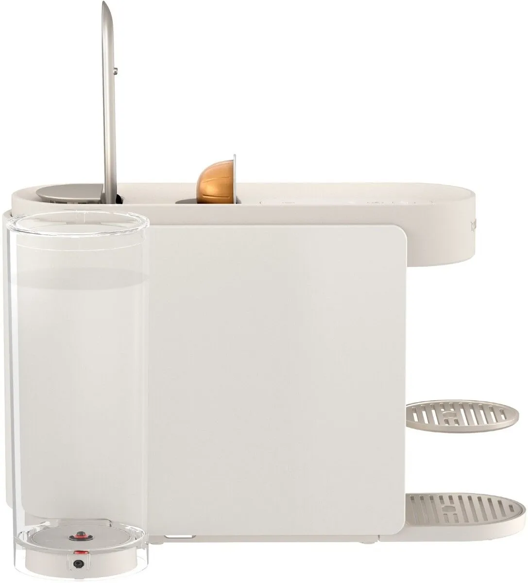 Biała maszyna do kawy z pojemnikiem na mleko i kapsułką.