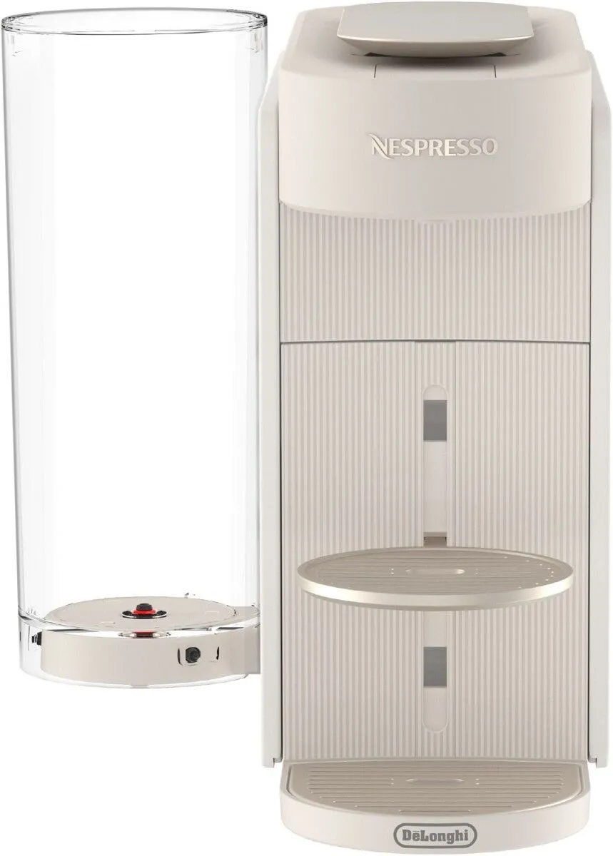 Biała maszyna do kawy Nespresso stoi obok wysokiego szklanego pojemnika.