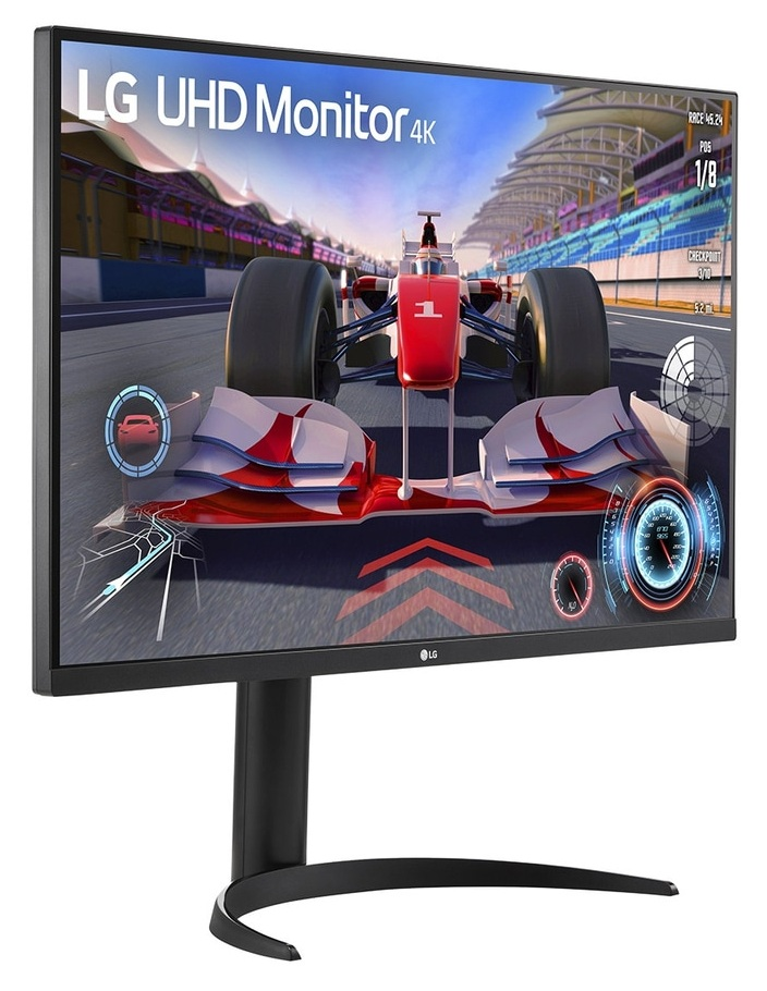 Monitor LG UHD 4K wyświetla grę wyścigową z czerwonym bolidem F1 na torze.