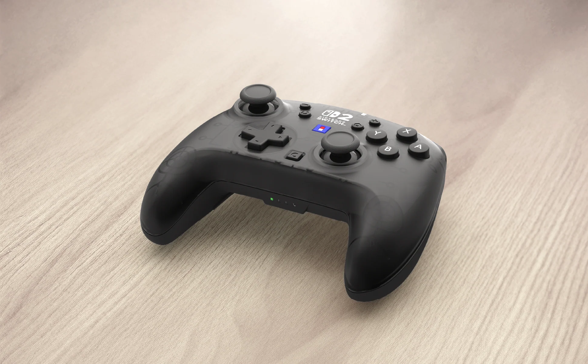 Un controller nero Nintendo Switch poggia su un tavolo di legno.