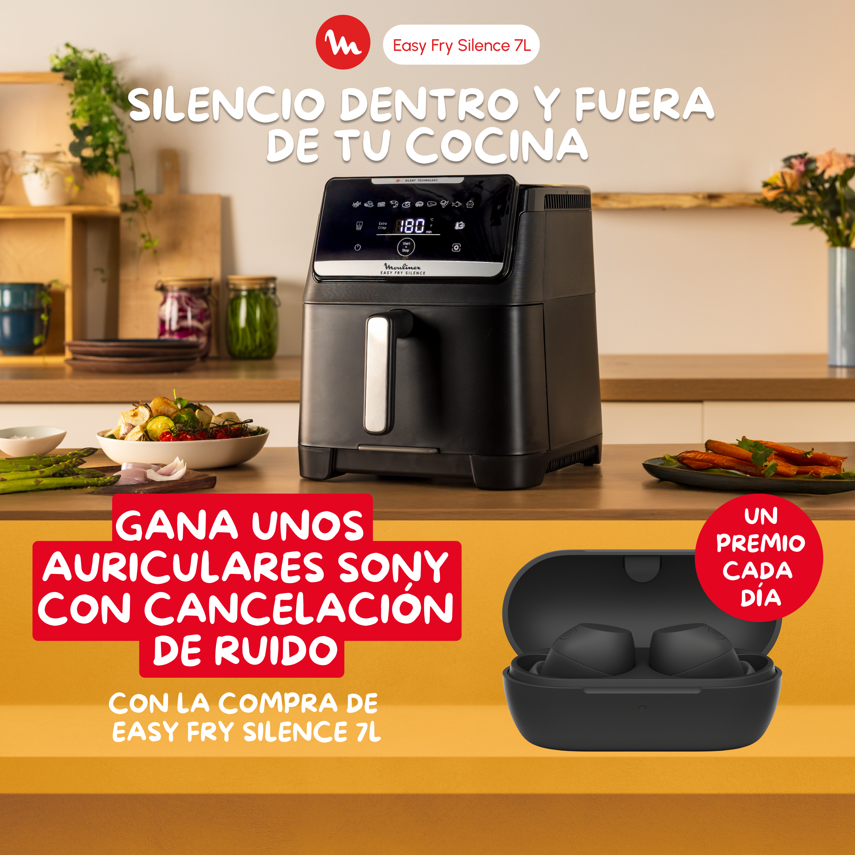 Una freidora de aire negra en una encimera de cocina con comida y auriculares.