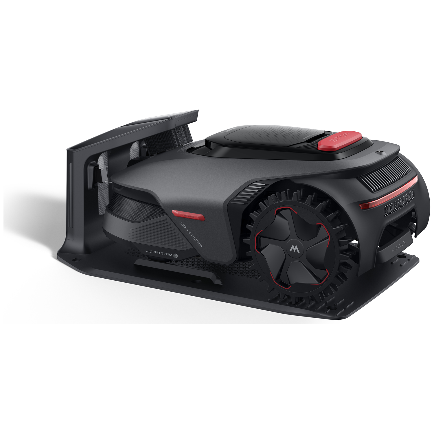 A black robotic lawn mower with red accents on a charging station.