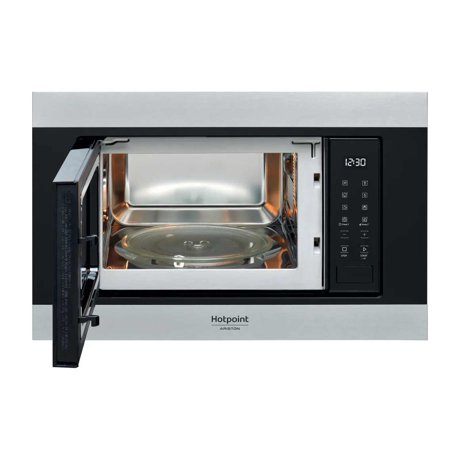 Un forno a microonde aperto con piatto girevole in vetro e display digitale.