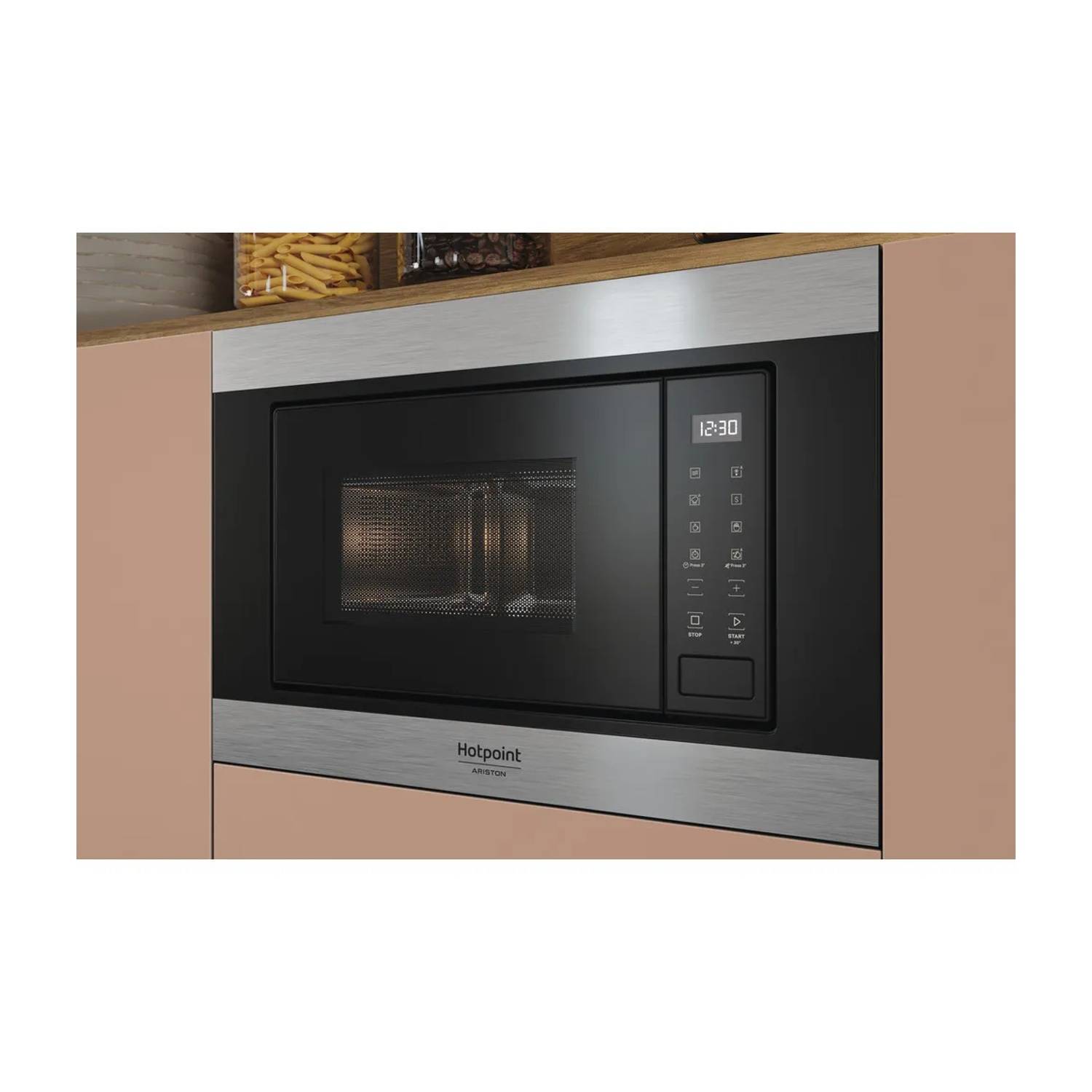 Un microonde da incasso Hotpoint Ariston con display digitale e pannello di controllo.