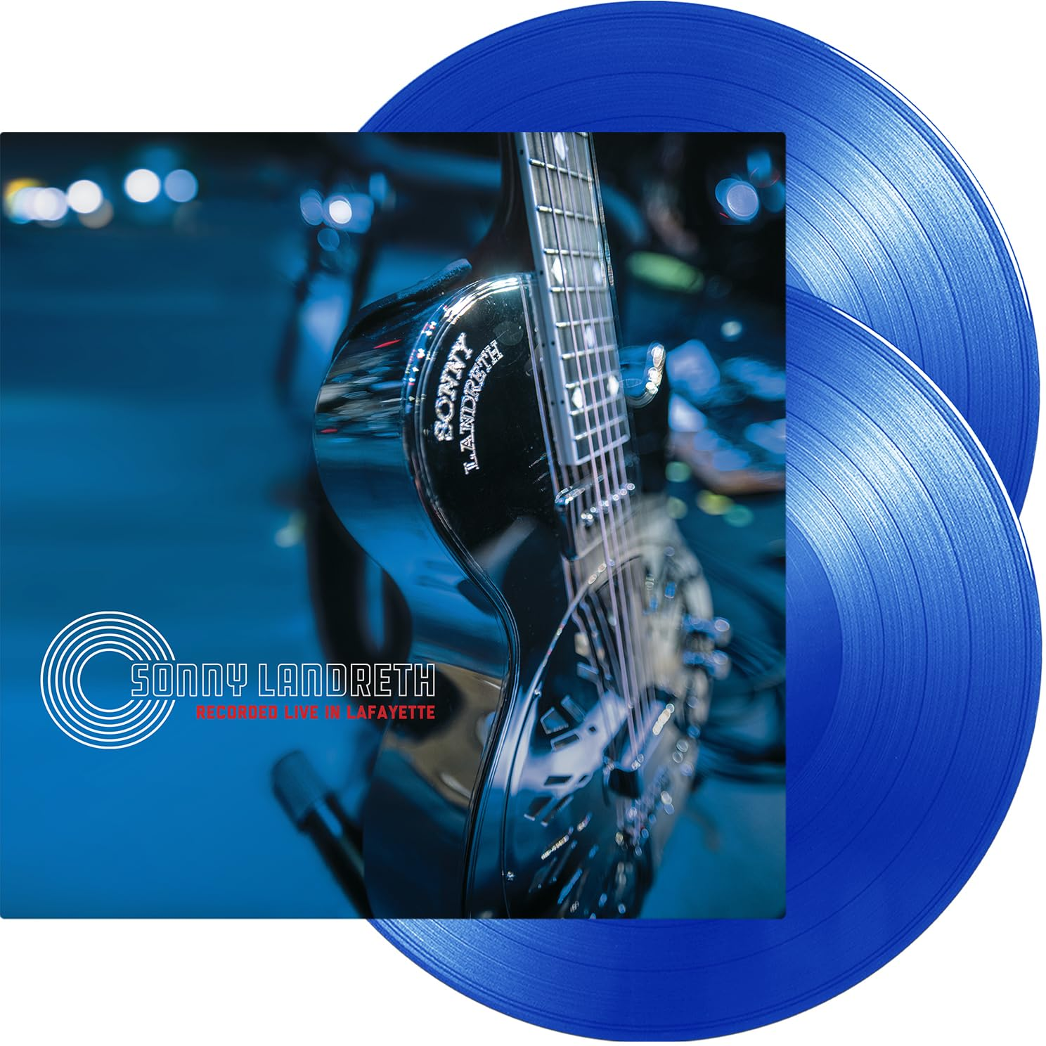 Sonny Landreth album borító gitárral és kék bakelit lemezekkel.