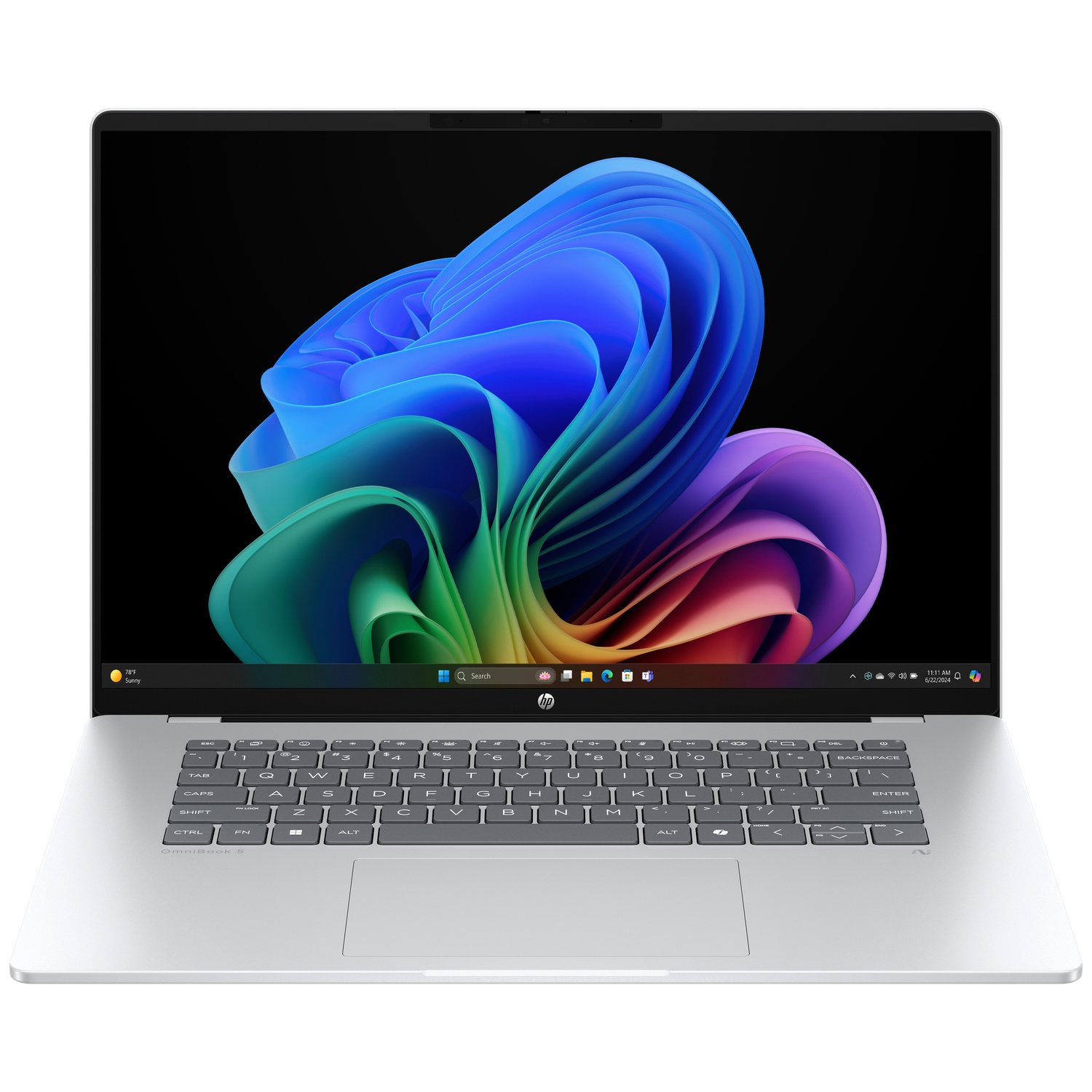 An open silver laptop displays a colorful abstract background on its screen.