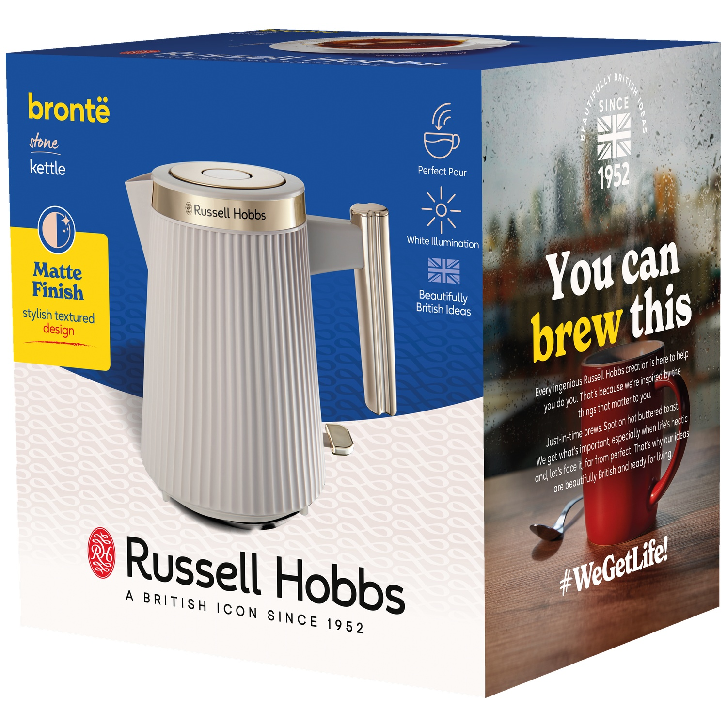 A white Russell Hobbs kettle with gold accents sits on its packaging.