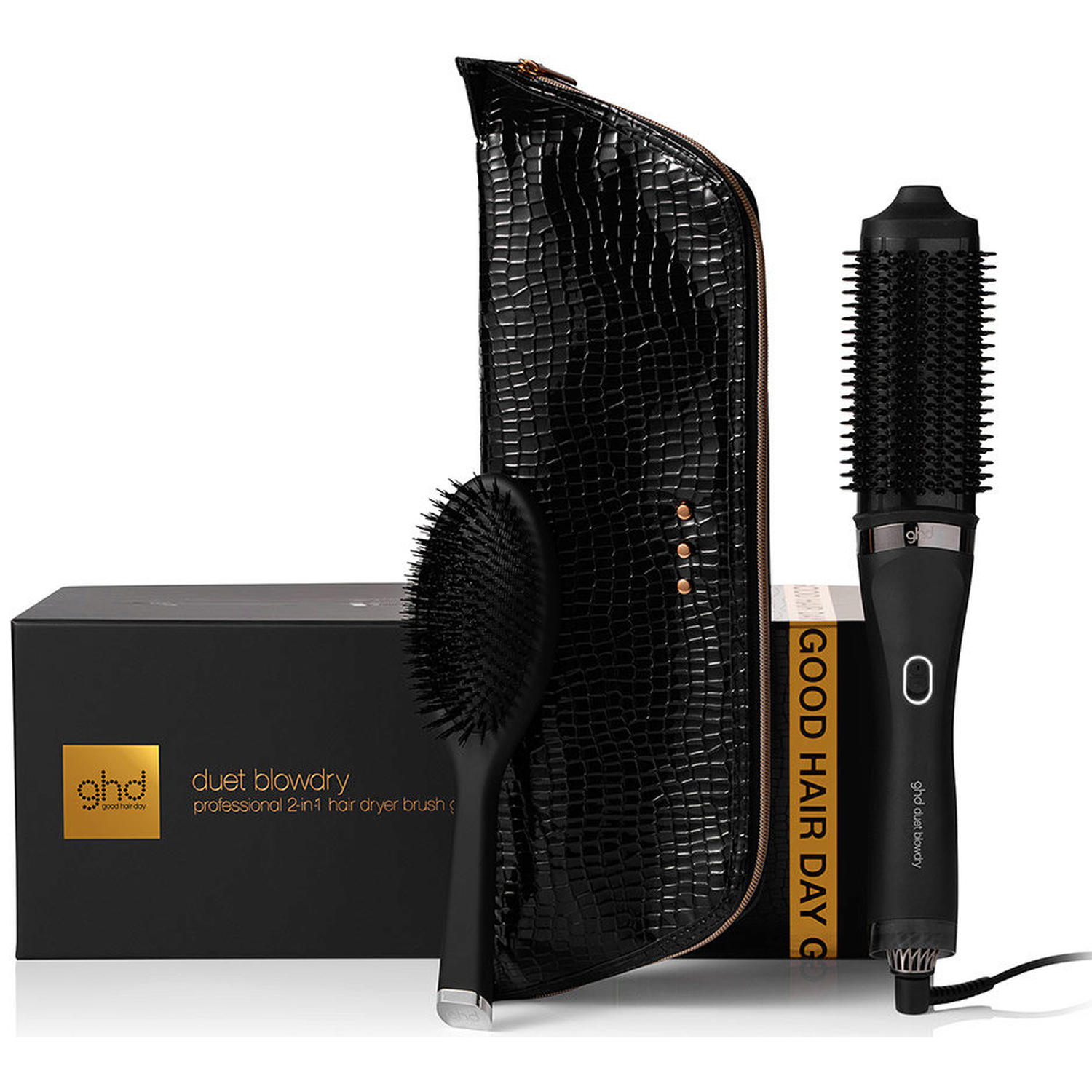 A black hair dryer brush set with a case and box.
