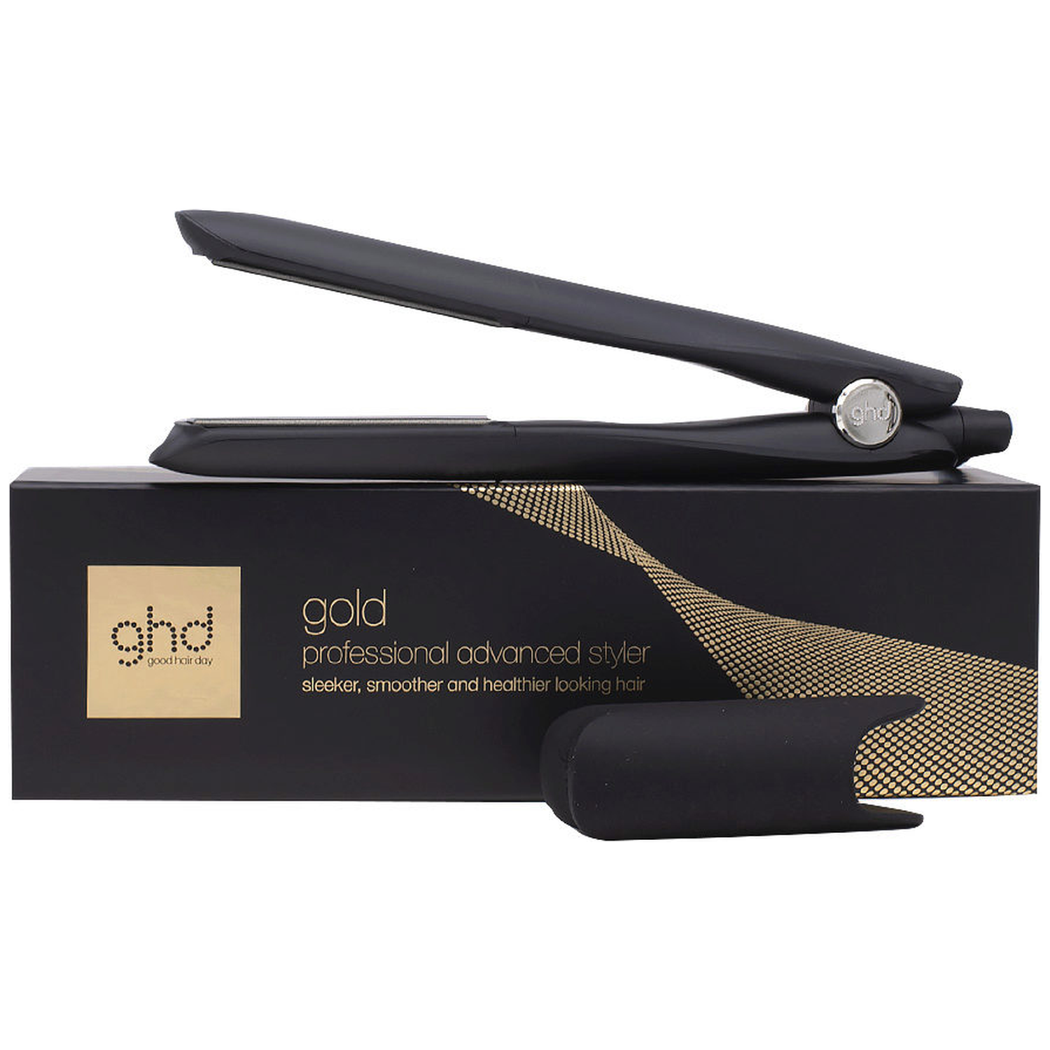 A black GHD hair straightener rests on a black box with gold accents.