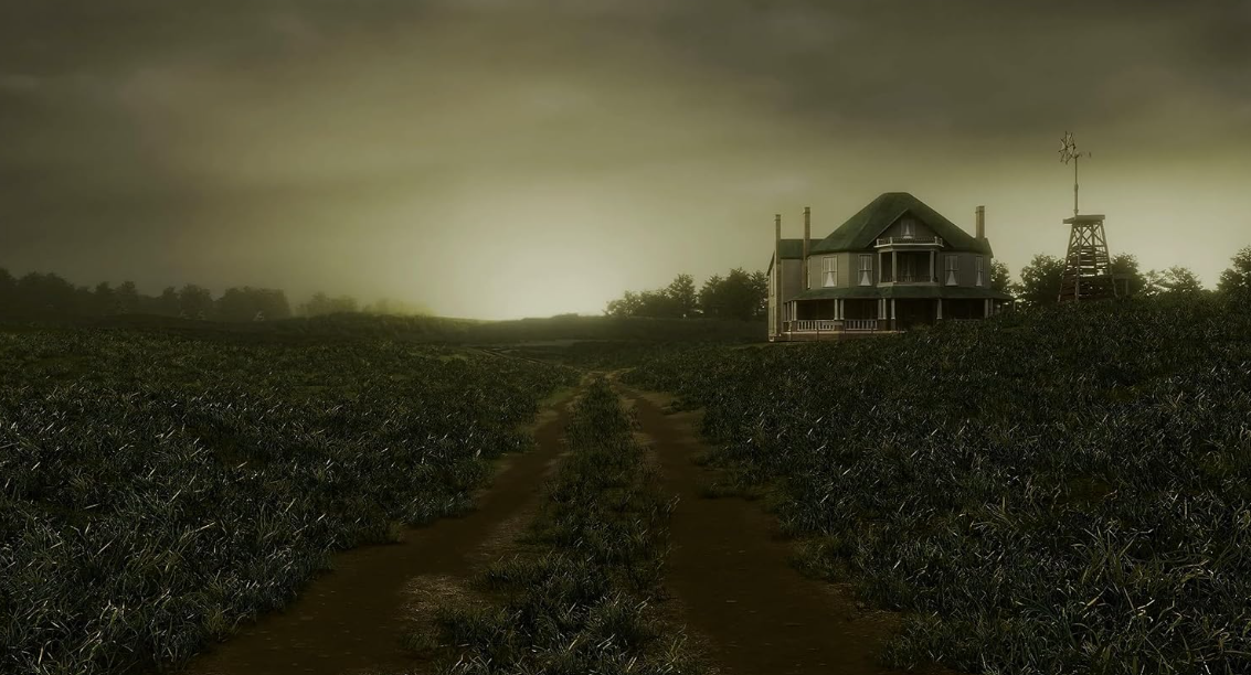 Ein Haus mit Windrad im Feld bei Nebel.