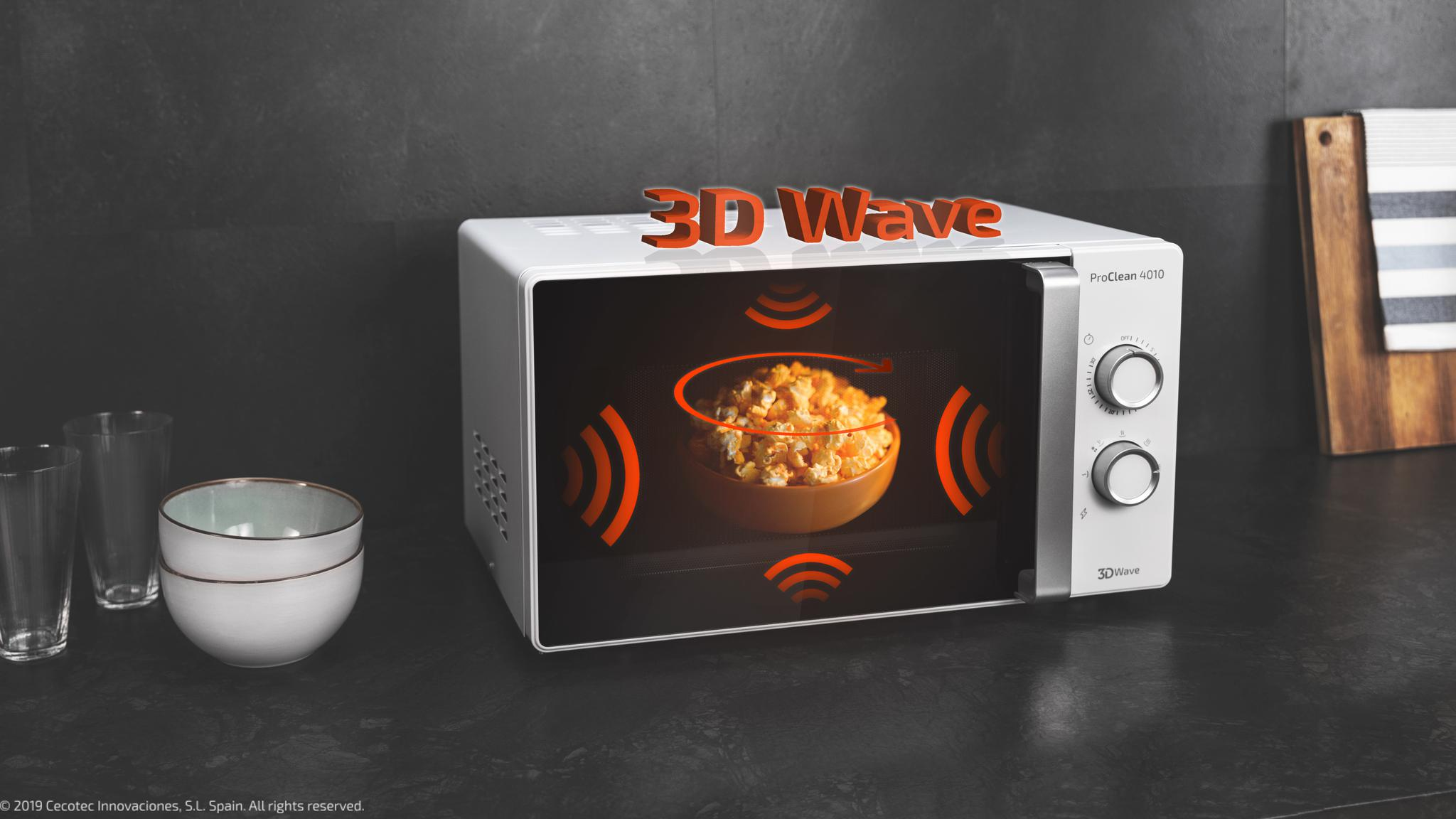 Microondas blanco con palomitas dentro, ondas naranjas indican tecnología 3D Wave.