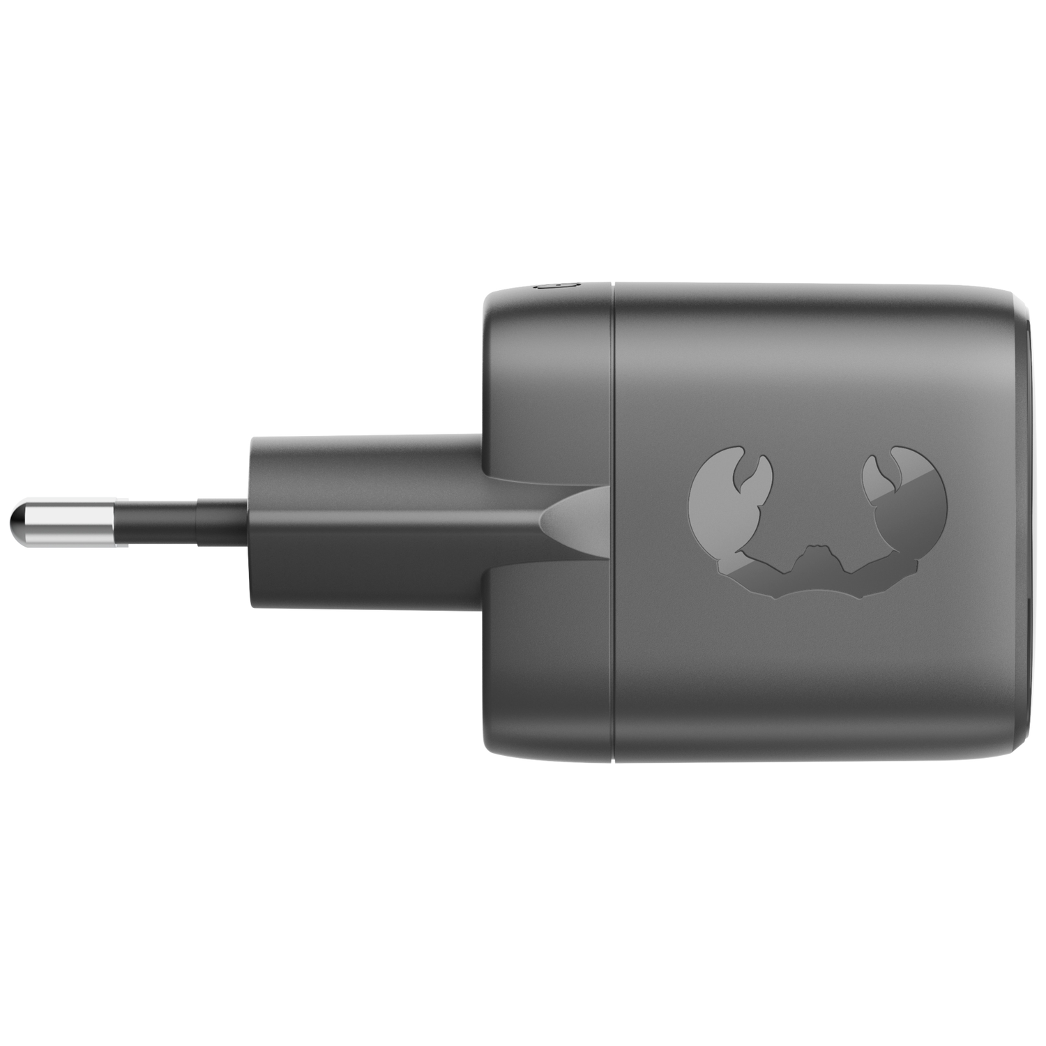 A dark travel adapter featuring a stylized crab design.
