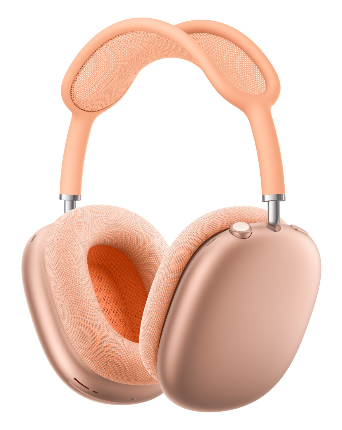 Para brzoskwiniowych słuchawek nausznych z siateczkowym pałąkiem i nausznikami.