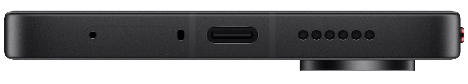 Zbliżenie czarnej powierzchni z portem USB-C, grillami głośników i dwoma czerwonymi światłami.