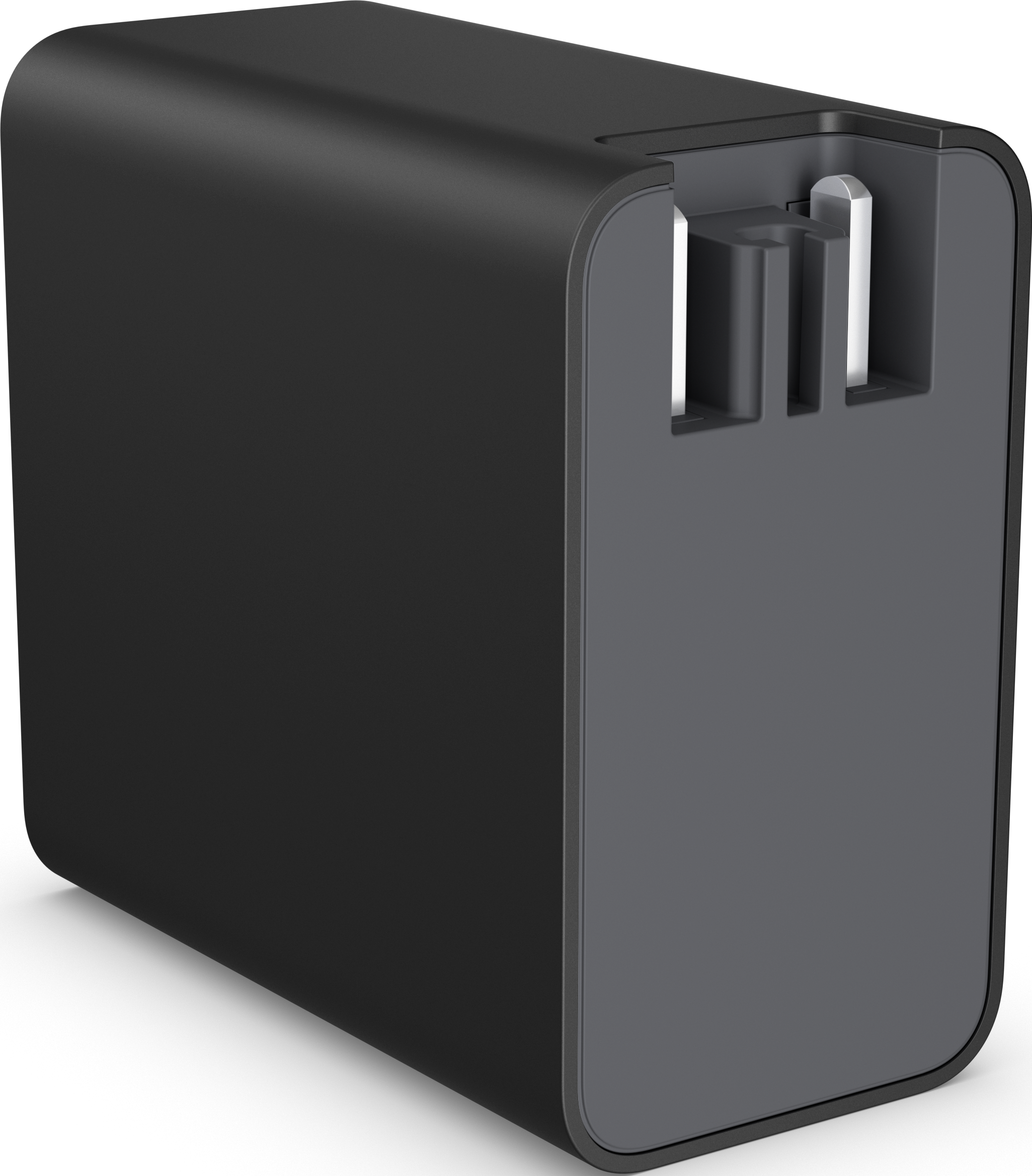Ein schwarzer Reiseadapter mit zwei USB-Anschlüssen. Das Gehäuse ist glatt und abgerundet.