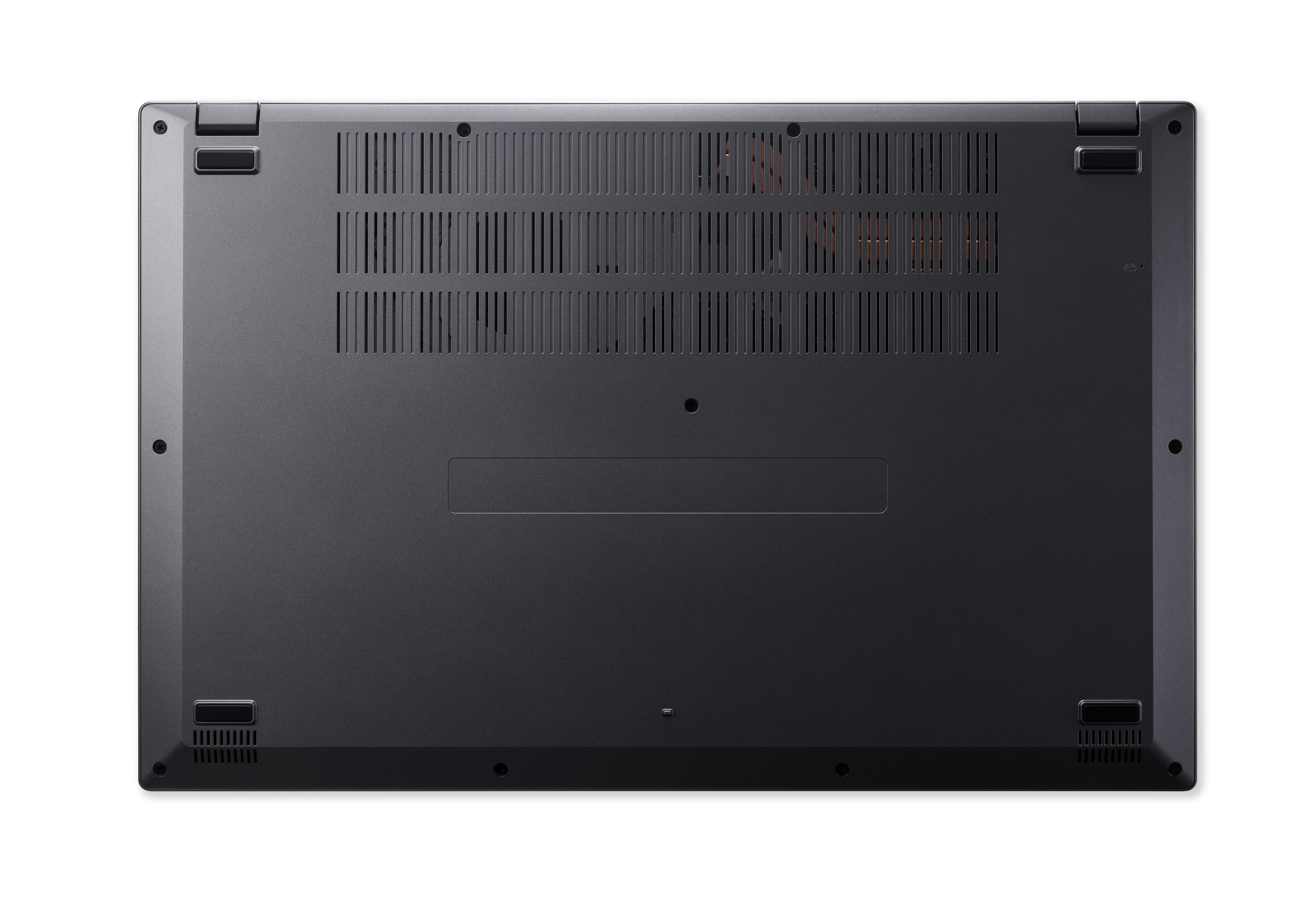 Unterseite eines schwarzen Laptops mit Lüftungsschlitzen und Gummifüßen.