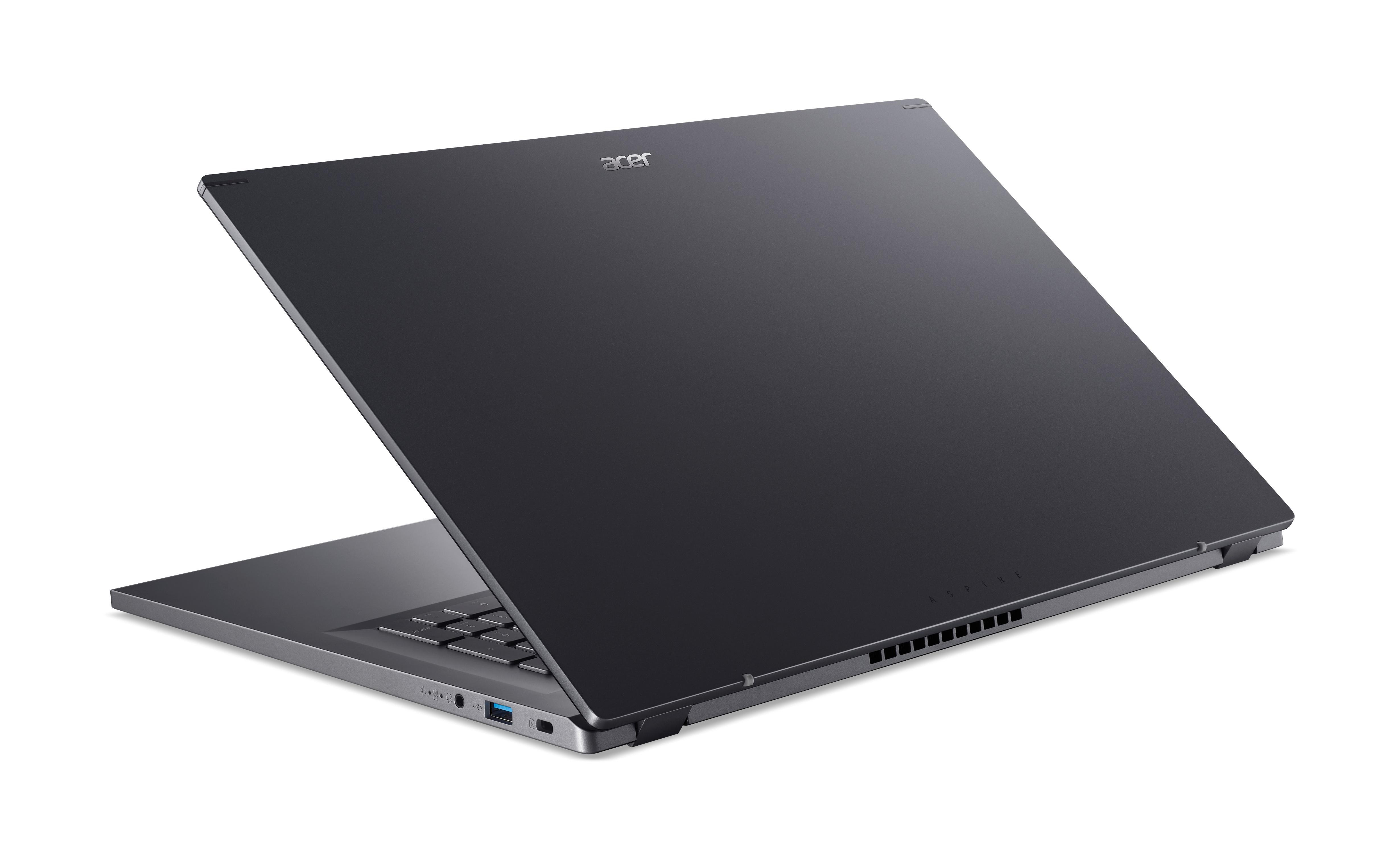 Ein dunkles Acer Aspire Notebook mit Tastatur und USB-Anschlüssen.
