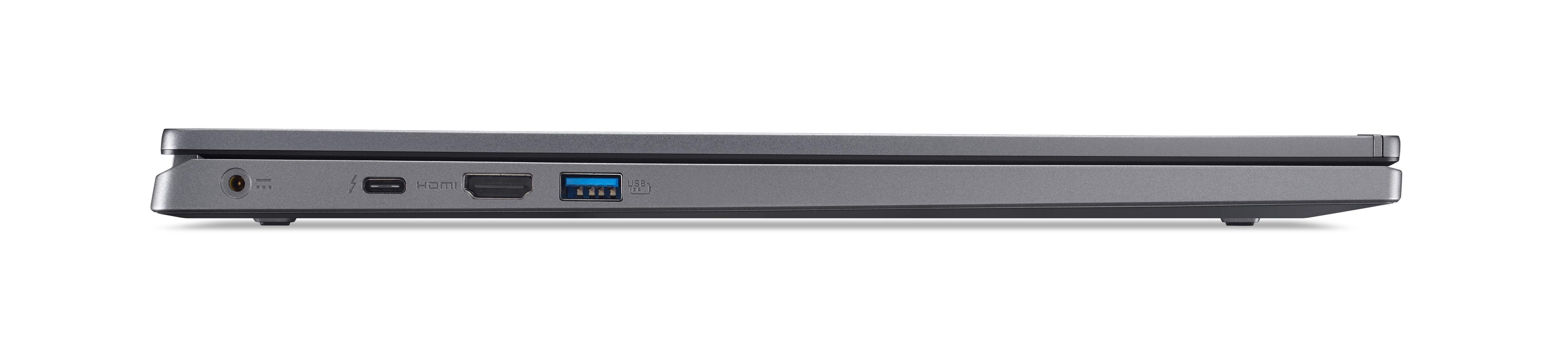 Graues Laptop-Gehäuse mit Anschlüssen: Strom, Blitz, HDMI, USB.