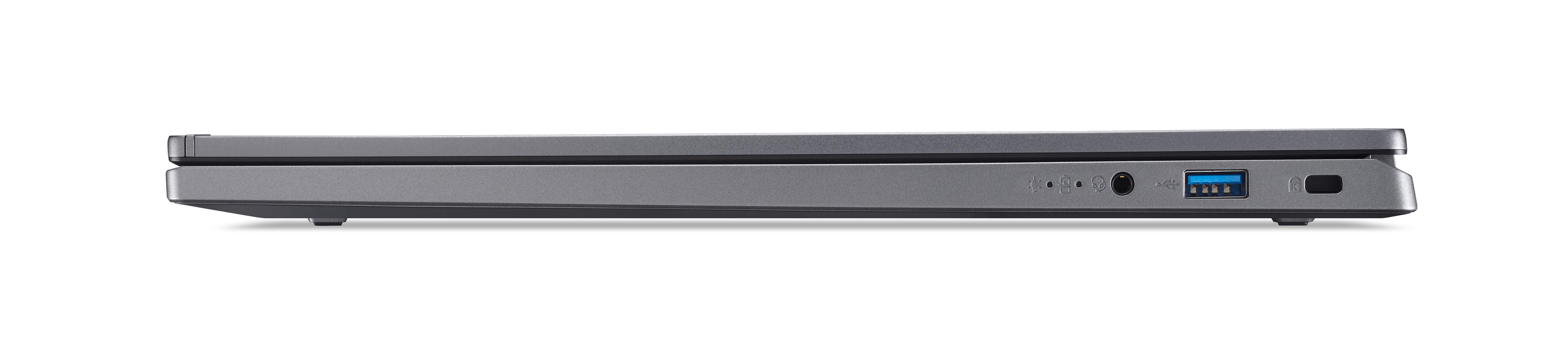 Grauer Laptop mit USB-Anschluss, Kopfhöreranschluss und Netzschalter.