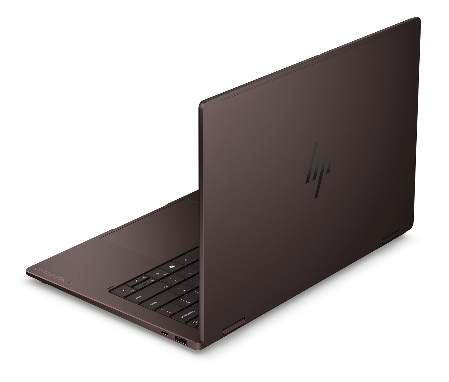 Un portátil HP Omnibook X cerrado, marrón oscuro con logo plateado de HP.