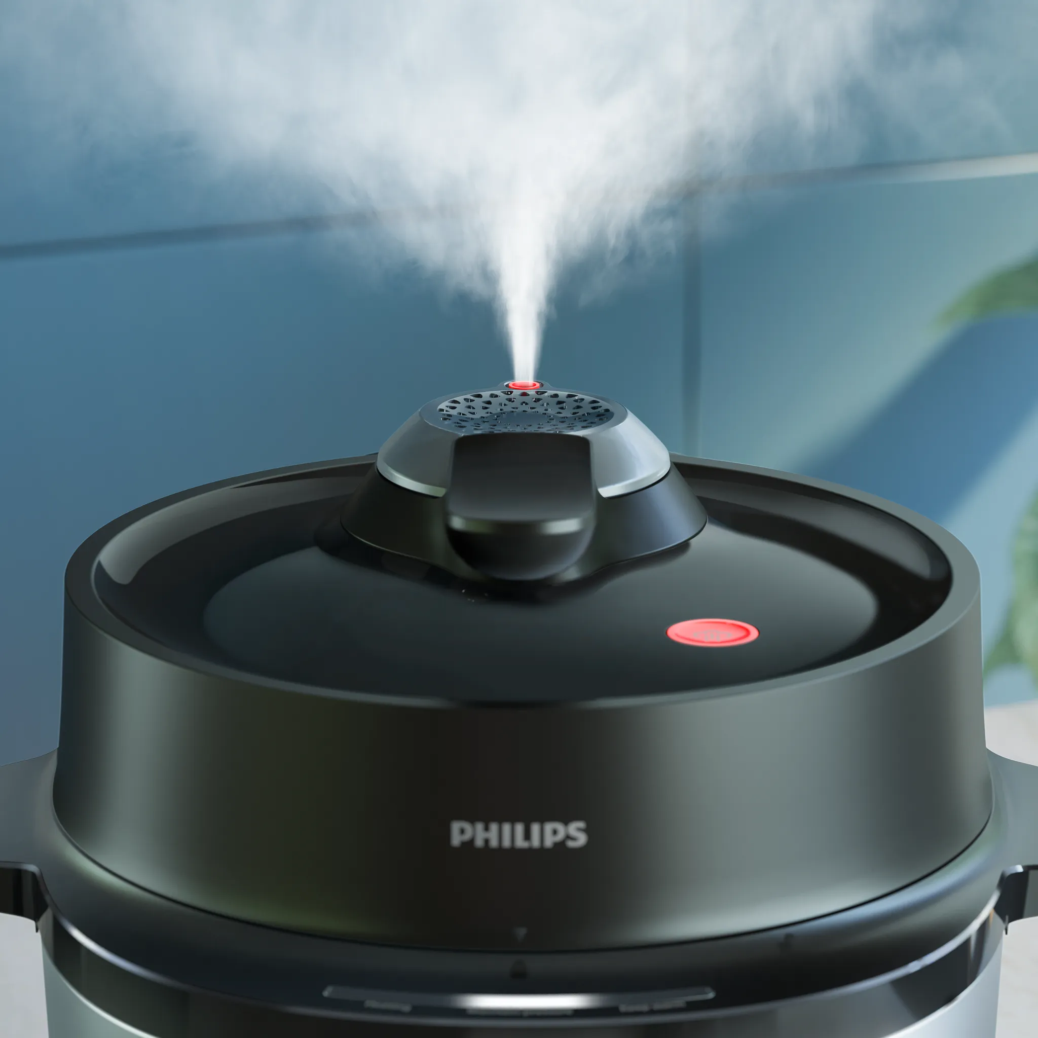 Egy fekete Philips multifunkciós főző, amelyből gőz szivárog a szelepből.