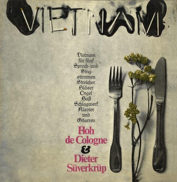 Ein Buchcover mit dem Wort VIETNAM aus Streichhölzern, Gabel, Messer, Blüte.