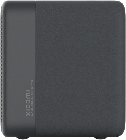 Egy texturált sötétszürke Xiaomi házimozi projektor.