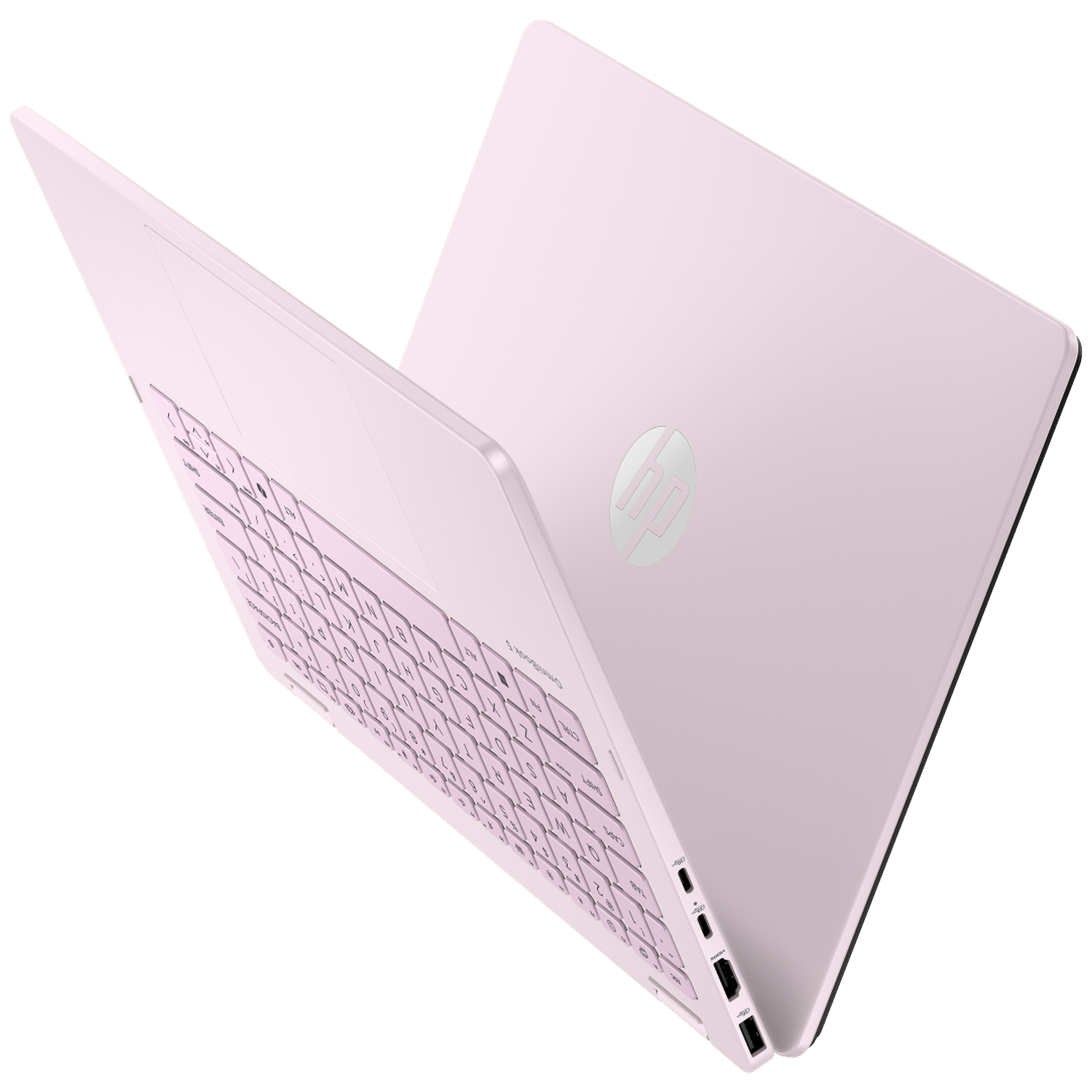 A light pink laptop is open. The keyboard and case are pink.