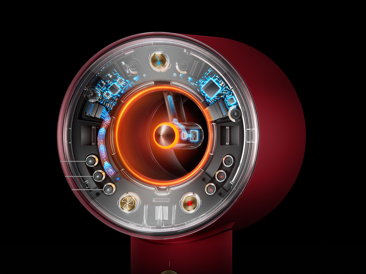Secador de pelo rojo con interior transparente, circuitos brillantes y turbina.