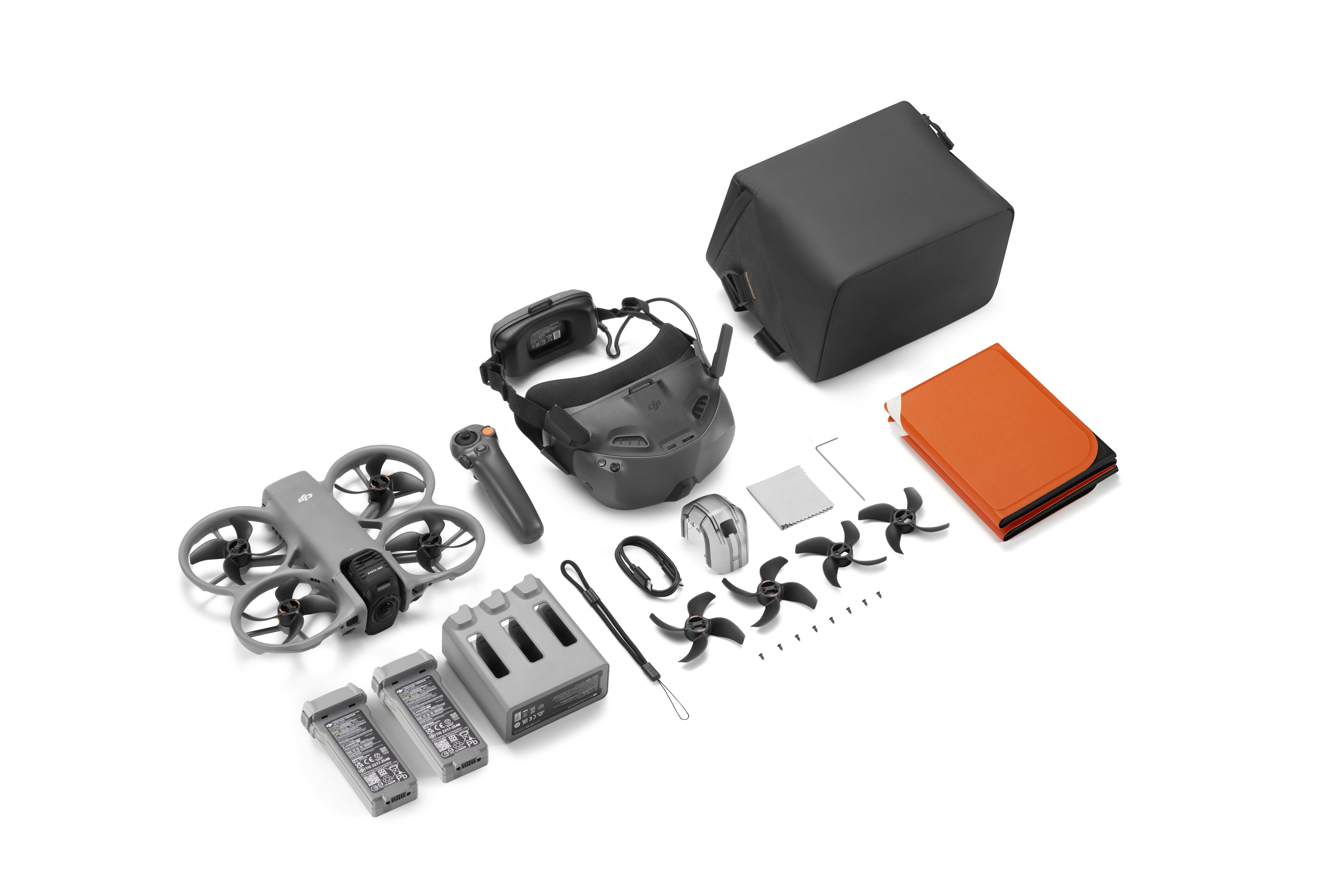 Grauer DJI Avata Drohnen-Kit mit Zubehör, Controller und Brille.
