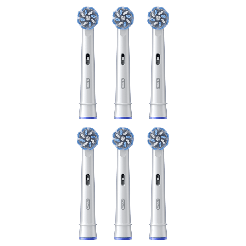 Seis cabezales blancos Oral-B con cerdas azules sobre fondo verde.