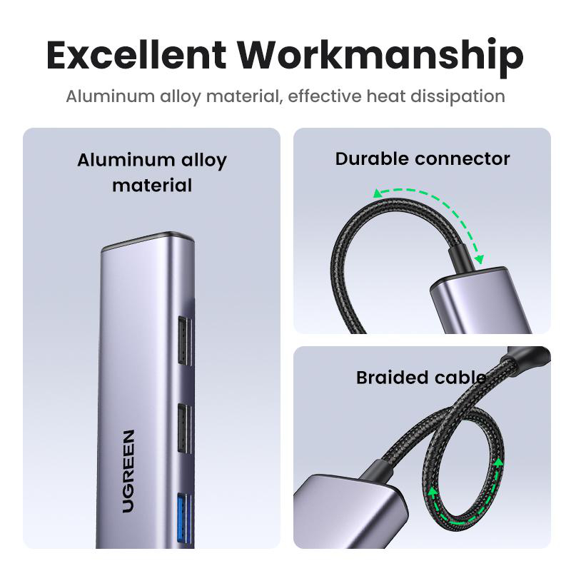 Grauer USB-Hub aus Aluminiumlegierung mit Anschlüssen und Kabeln.